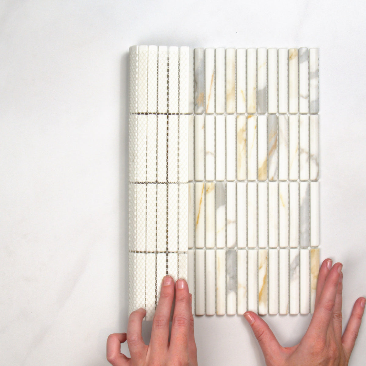 Boutique Calacatta Gold Mix Recycled Glass 3D Bar 297x303mm top view, hand for scale