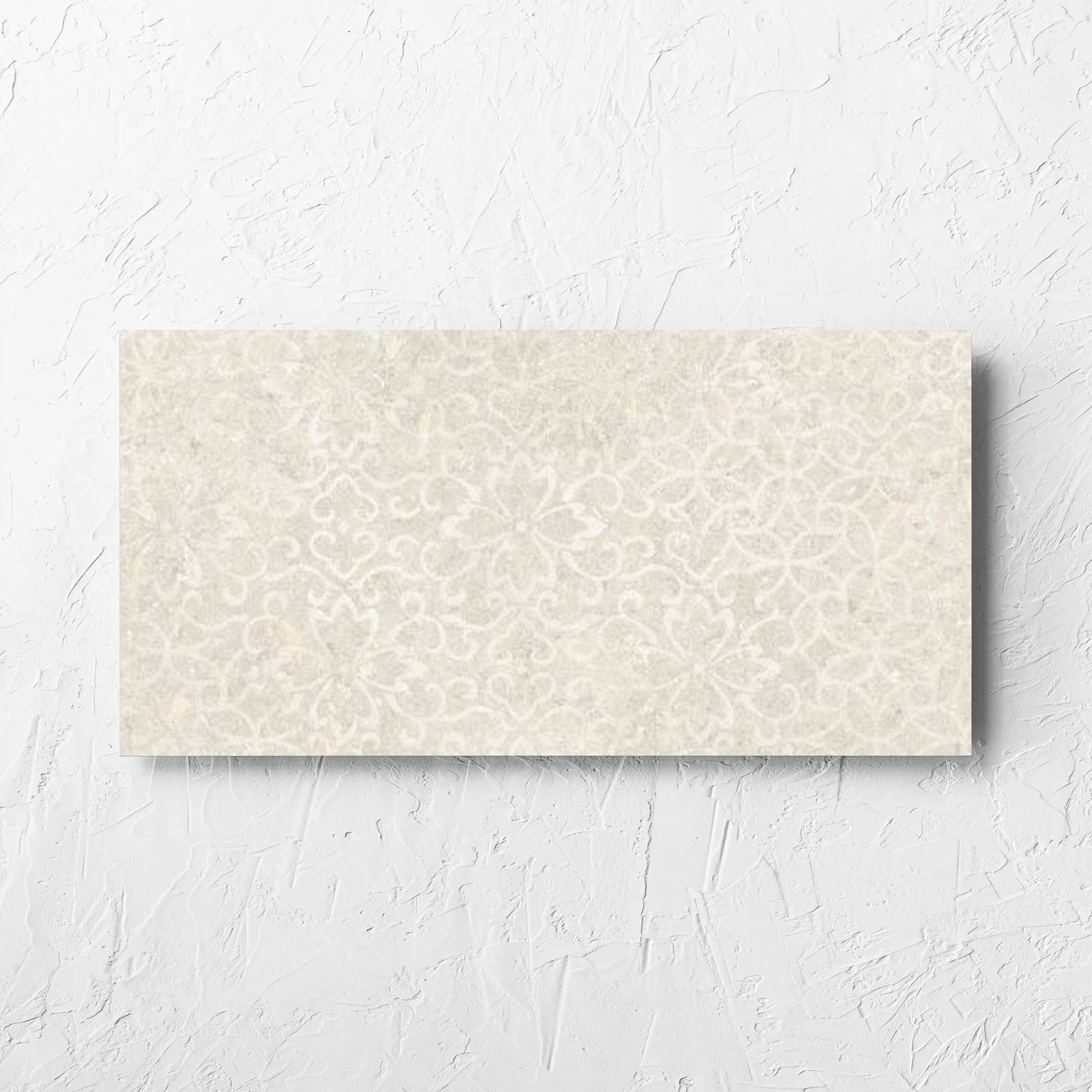 Brighton Beige 3D Decor 300x600mm tile laid flat on a white rendered wall, showing the matt surface