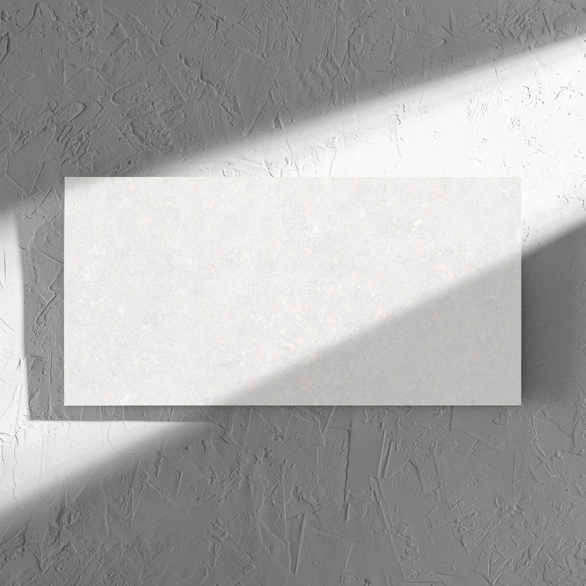 Brighton Bianco Matt 300x600mm tile in soft natural window light, showing the matt surface