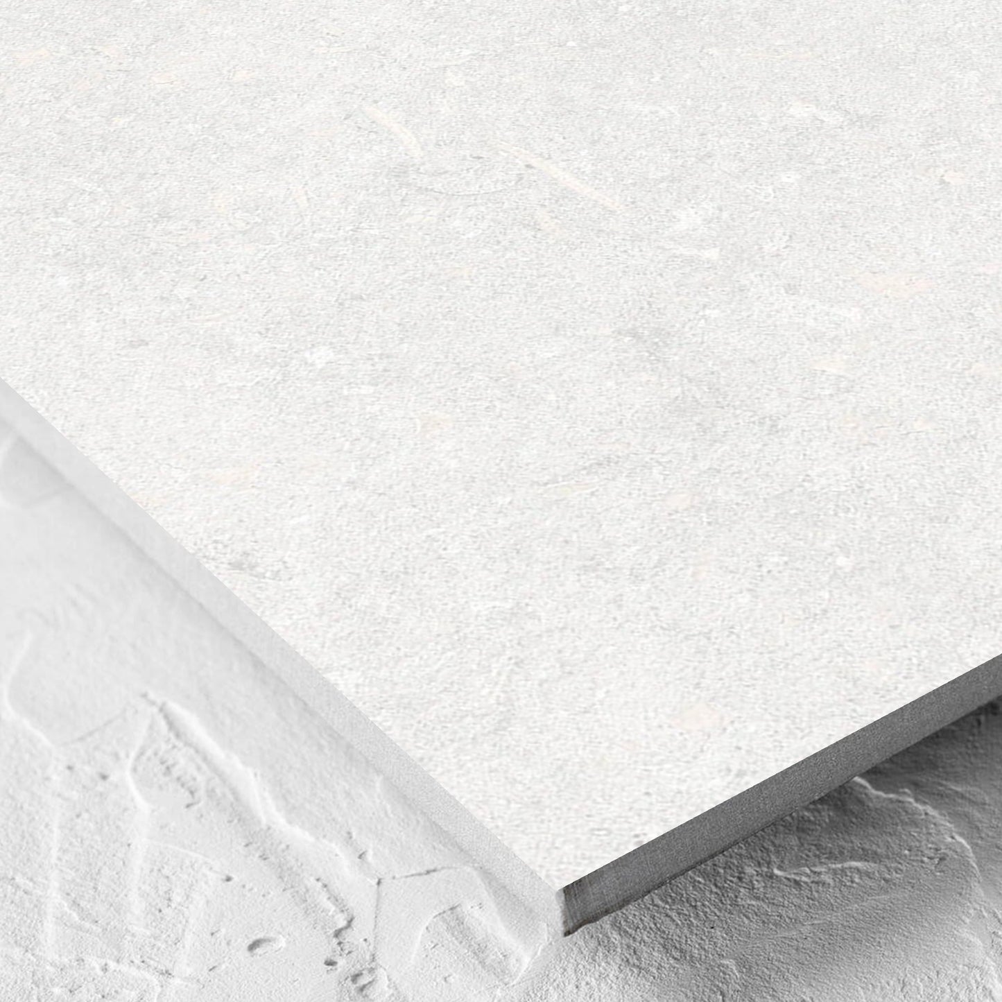 Corner close-up of the Brighton Bianco Matt 600x600mm tile showing the matt surface and the edge profile