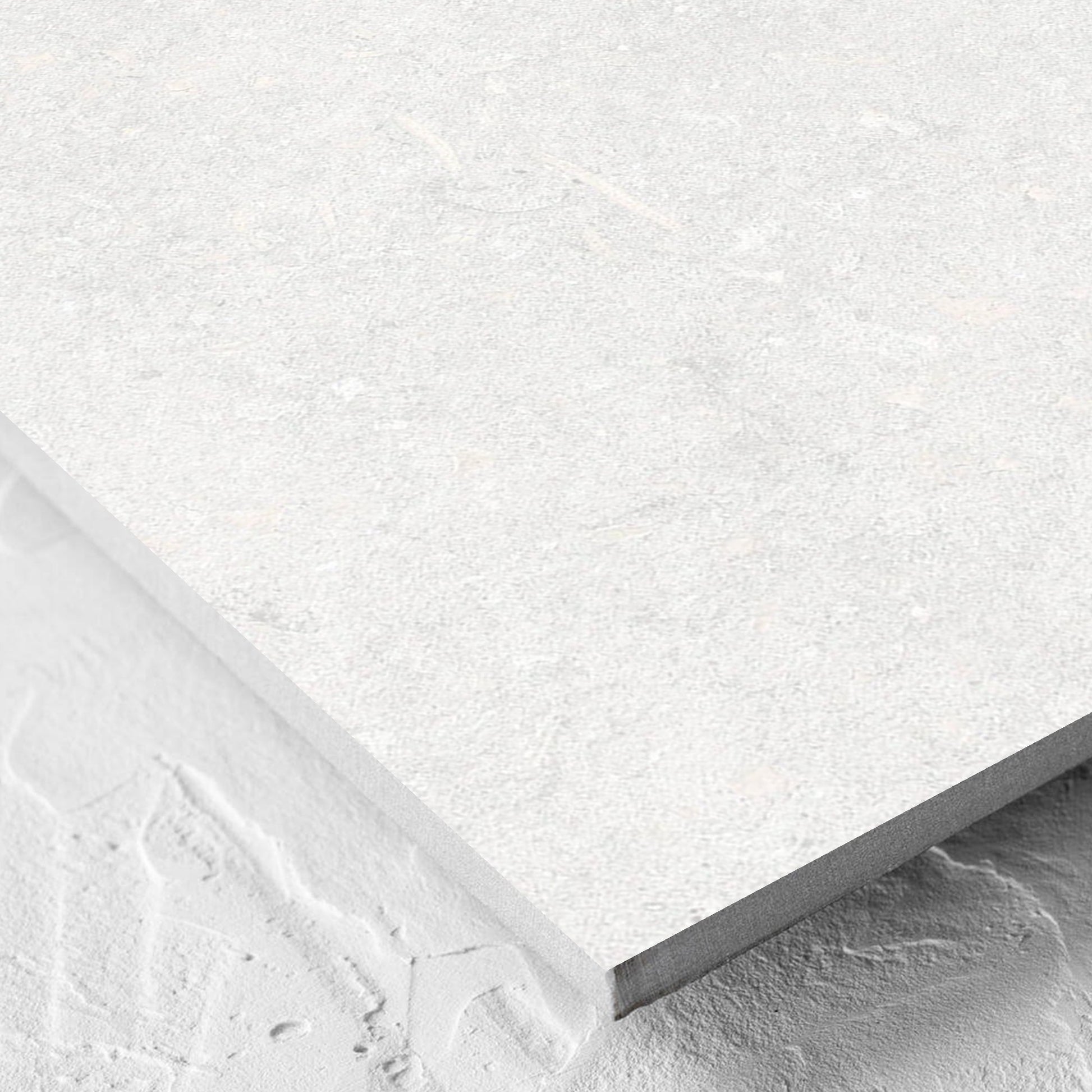 Corner close-up of the Brighton Bianco Matt 600x600mm tile showing the matt surface and the edge profile