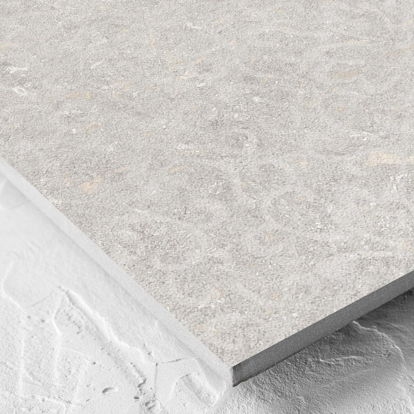 Corner close-up of the Brighton Stone Matt 600x600mm tile showing the matt surface and the edge profile