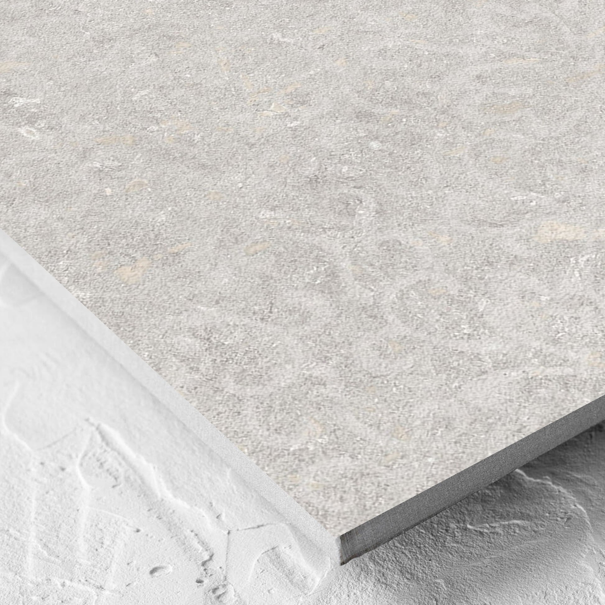 Corner close-up of the Brighton Stone Matt 600x600mm tile showing the matt surface and the edge profile