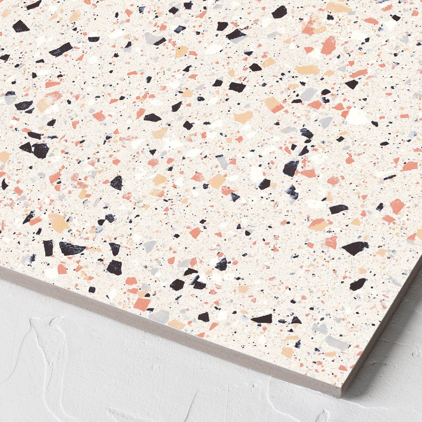 Corner close-up of the C Venice 300x300 Matt Pink Terrazzo Look Rectified tile showing the tile surface and the edge profile