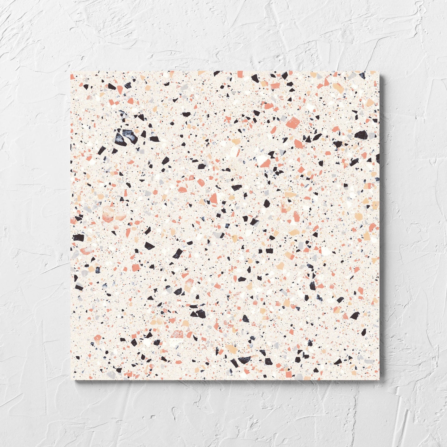C Venice 300x300 Matt Pink Terrazzo Look Rectified tile laid flat on a white rendered wall, showing the tile surface
