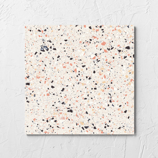 C Venice 300x300 Matt Pink Terrazzo Look Rectified tile laid flat on a white rendered wall, showing the tile surface