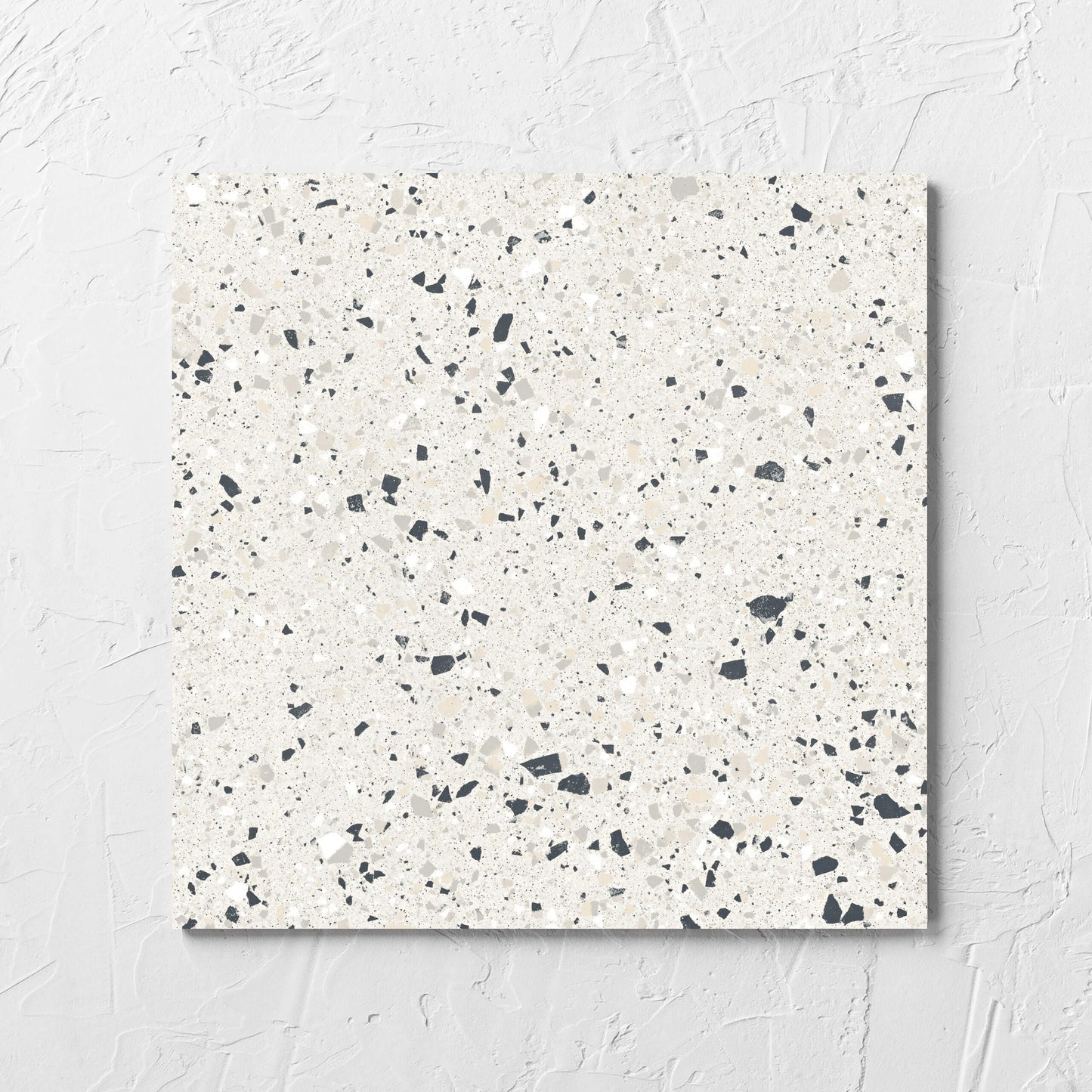 C Venice 300x300 Matt Silver Terrazzo Look Rectified tile laid flat on a white rendered wall, showing the tile surface