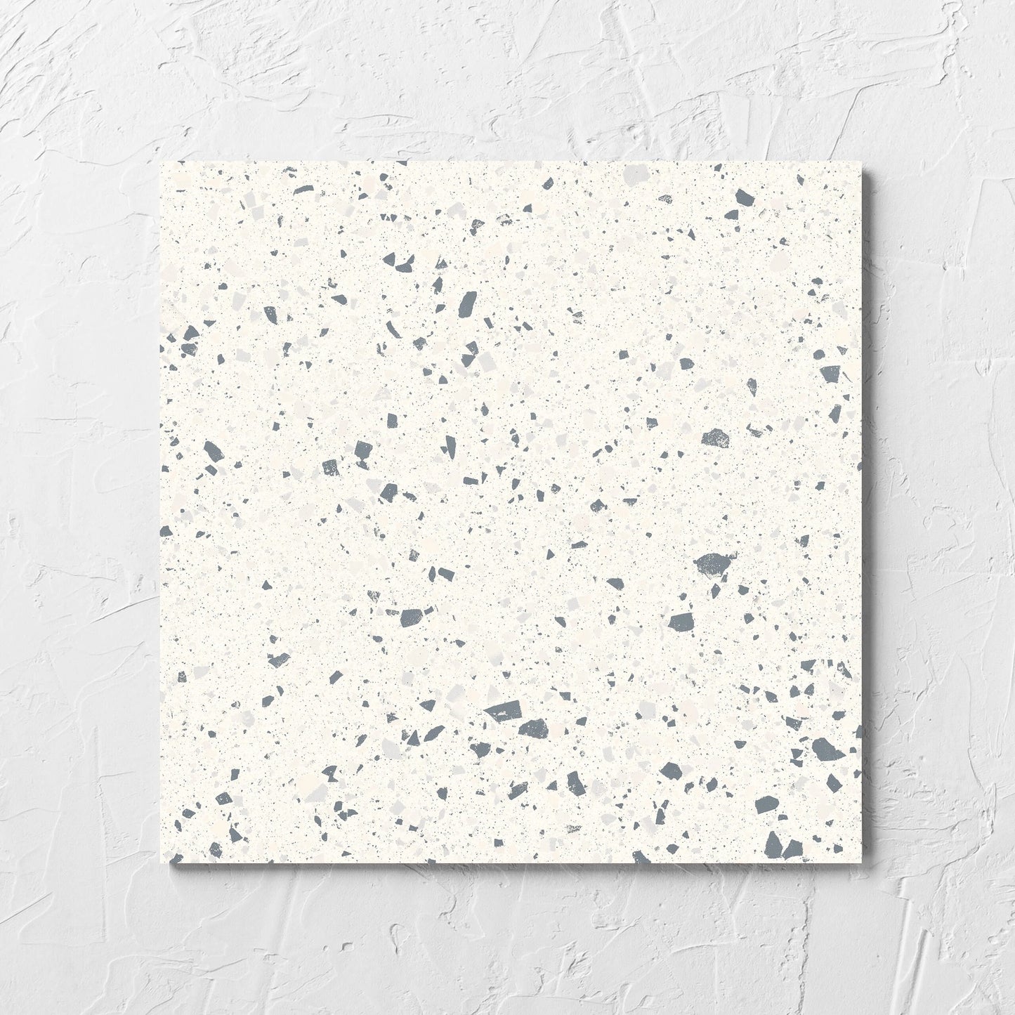 C Venice 300x300 Matt White Terrazzo Look Rectified tile laid flat on a white rendered wall, showing the tile surface