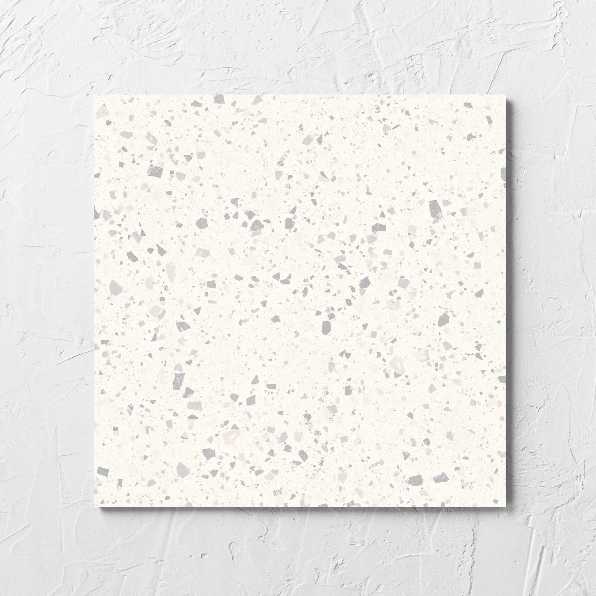 C Venice 300x300 Matt Zinc Terrazzo Look Rectified tile laid flat on a white rendered wall, showing the tile surface