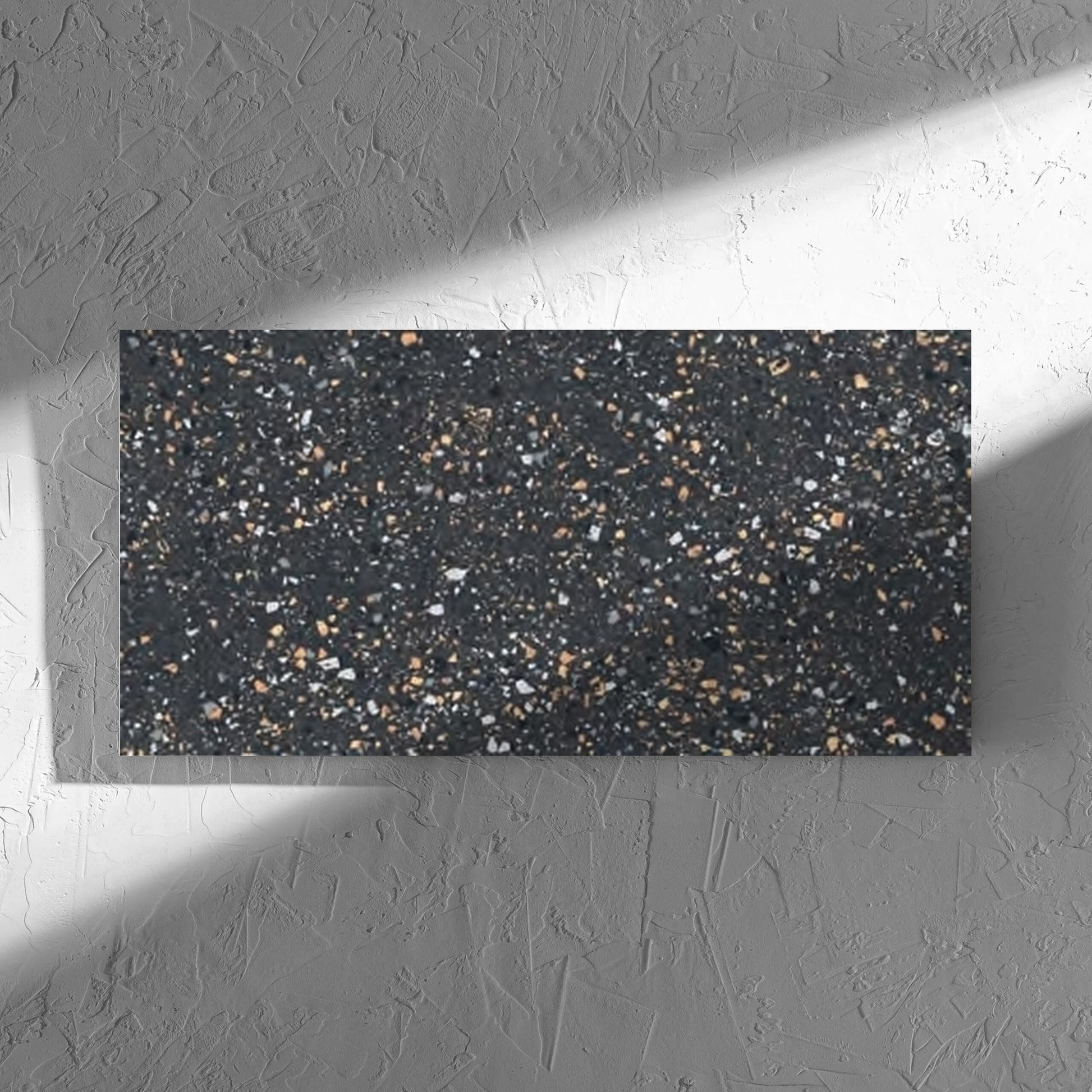 C Venice 300x600 Matt Graphite Terrazzo Look Rectified tile in soft natural window light, showing the tile surface