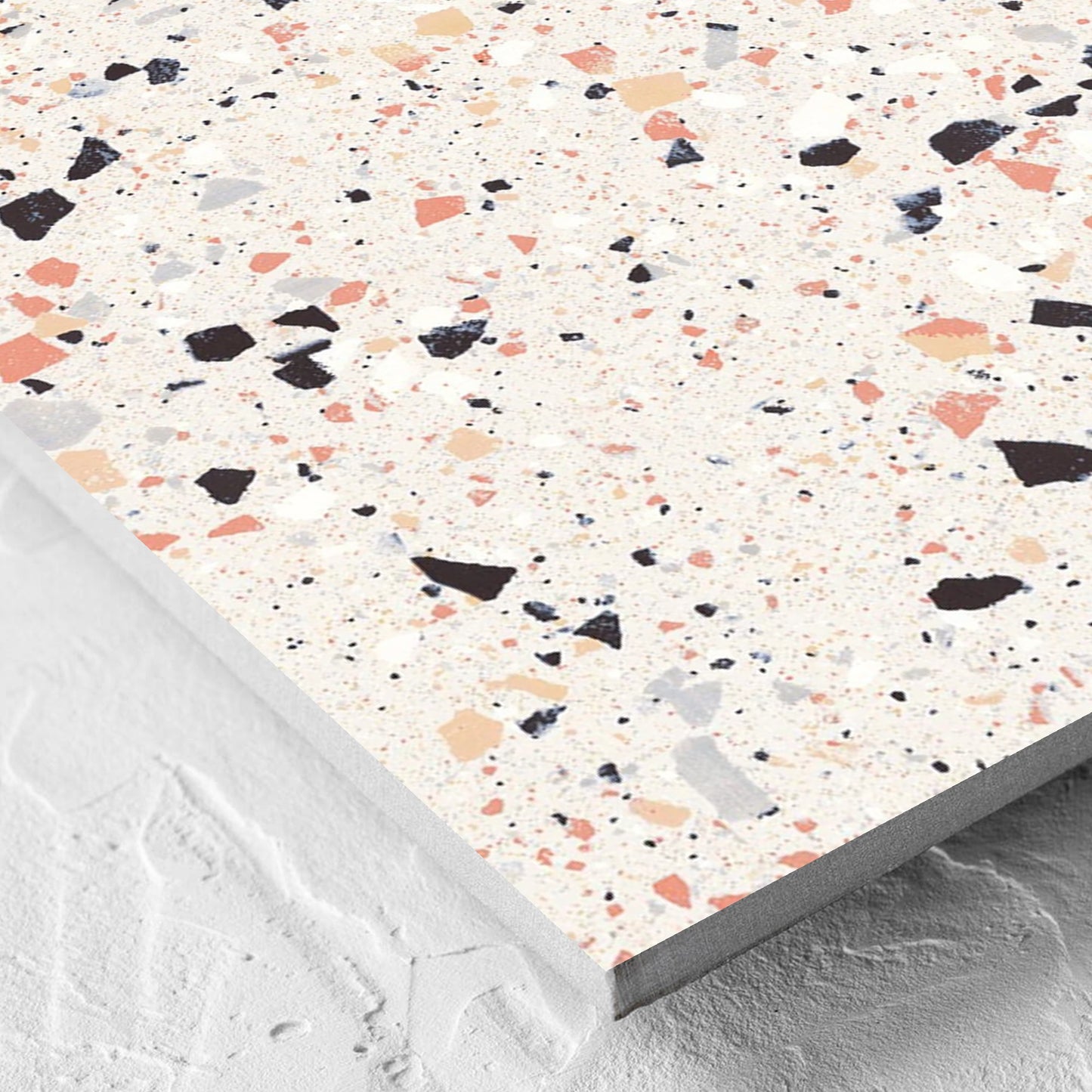Corner close-up of the C Venice 600x600 Matt Pink Terrazzo Look Rectified tile showing the pink matt surface and the edge profile