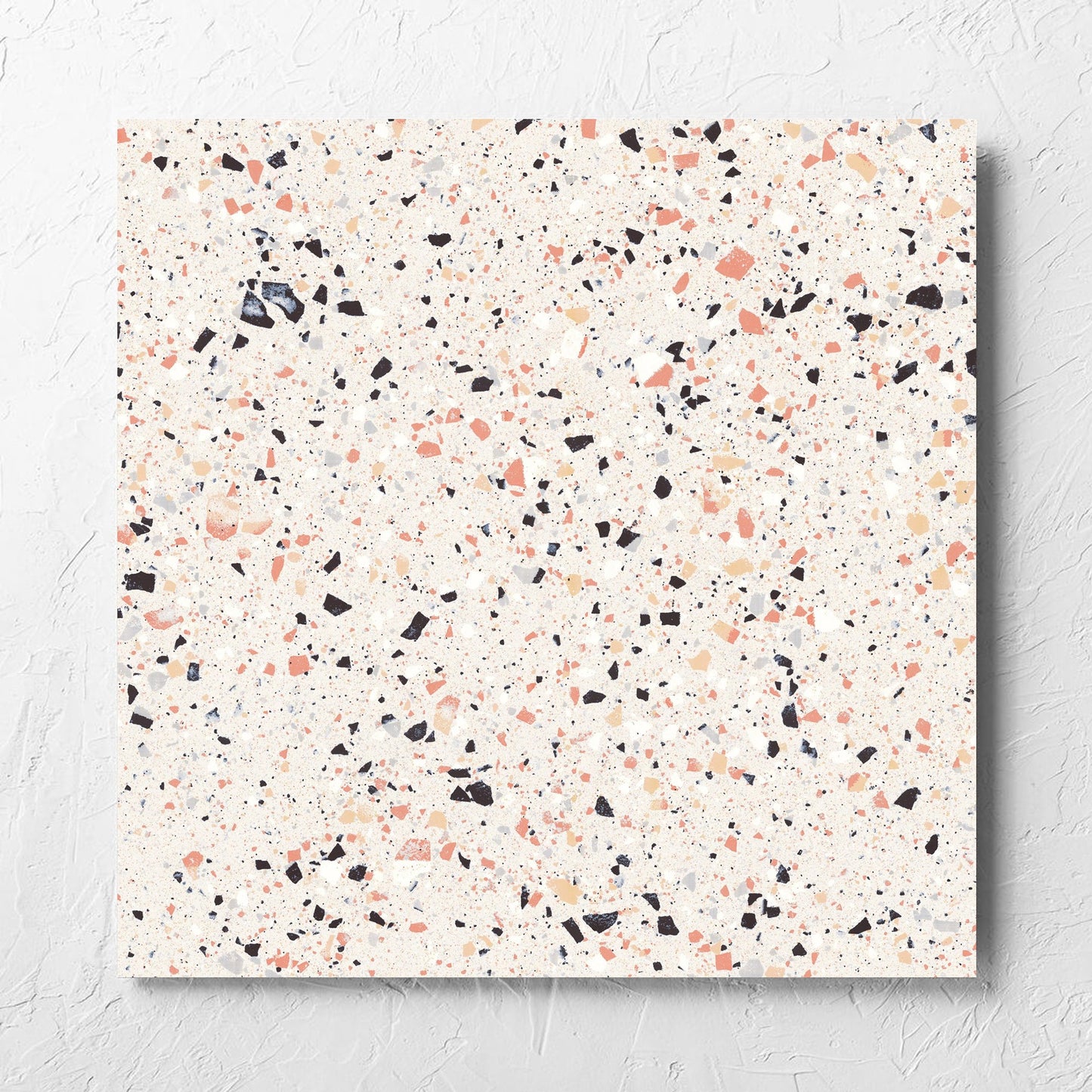 C Venice 600x600 Matt Pink Terrazzo Look Rectified tile laid flat on a white rendered wall, showing the pink matt surface
