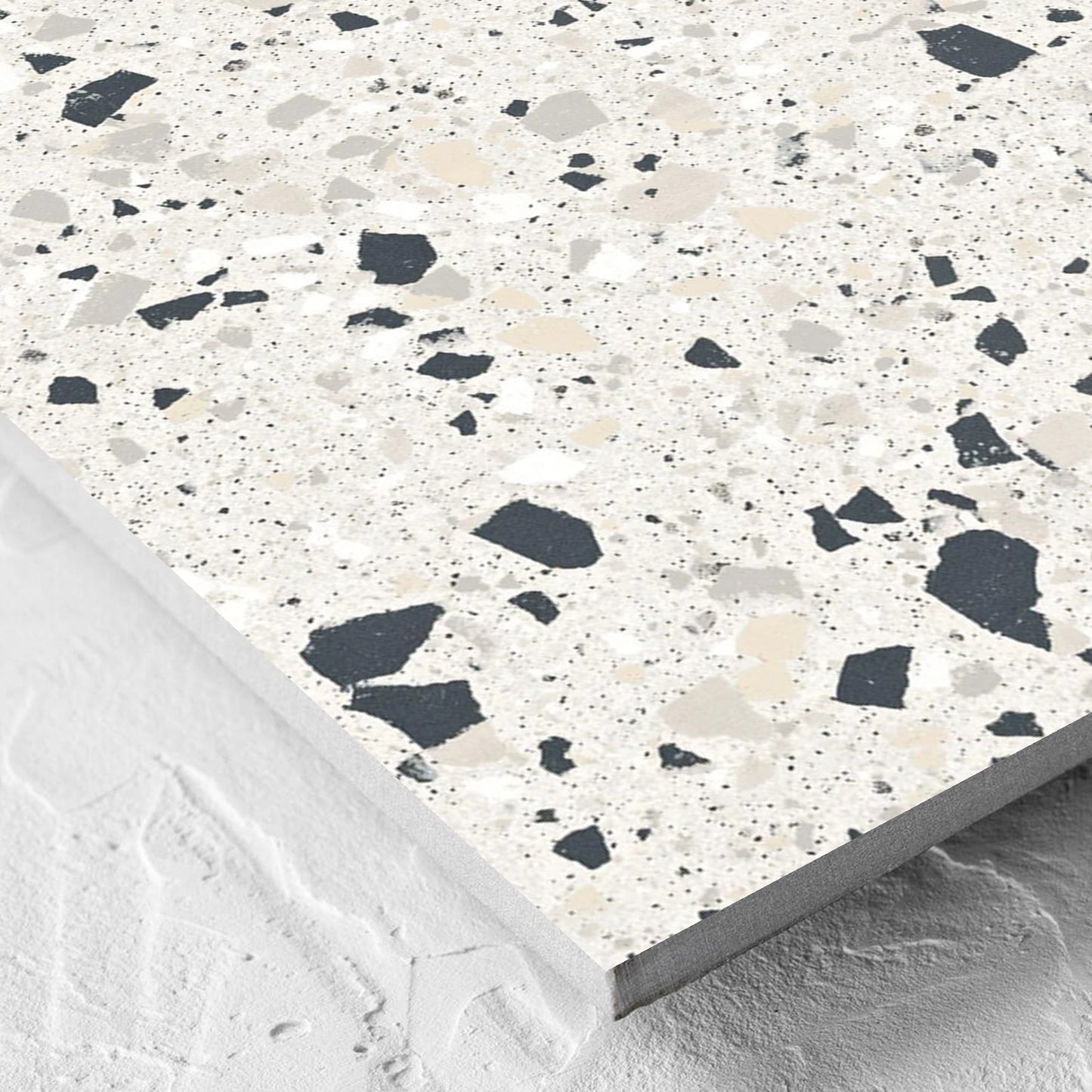 Corner close-up of the C Venice 600x600 Matt Silver Terrazzo Look Rectified tile showing the tile surface and the edge profile