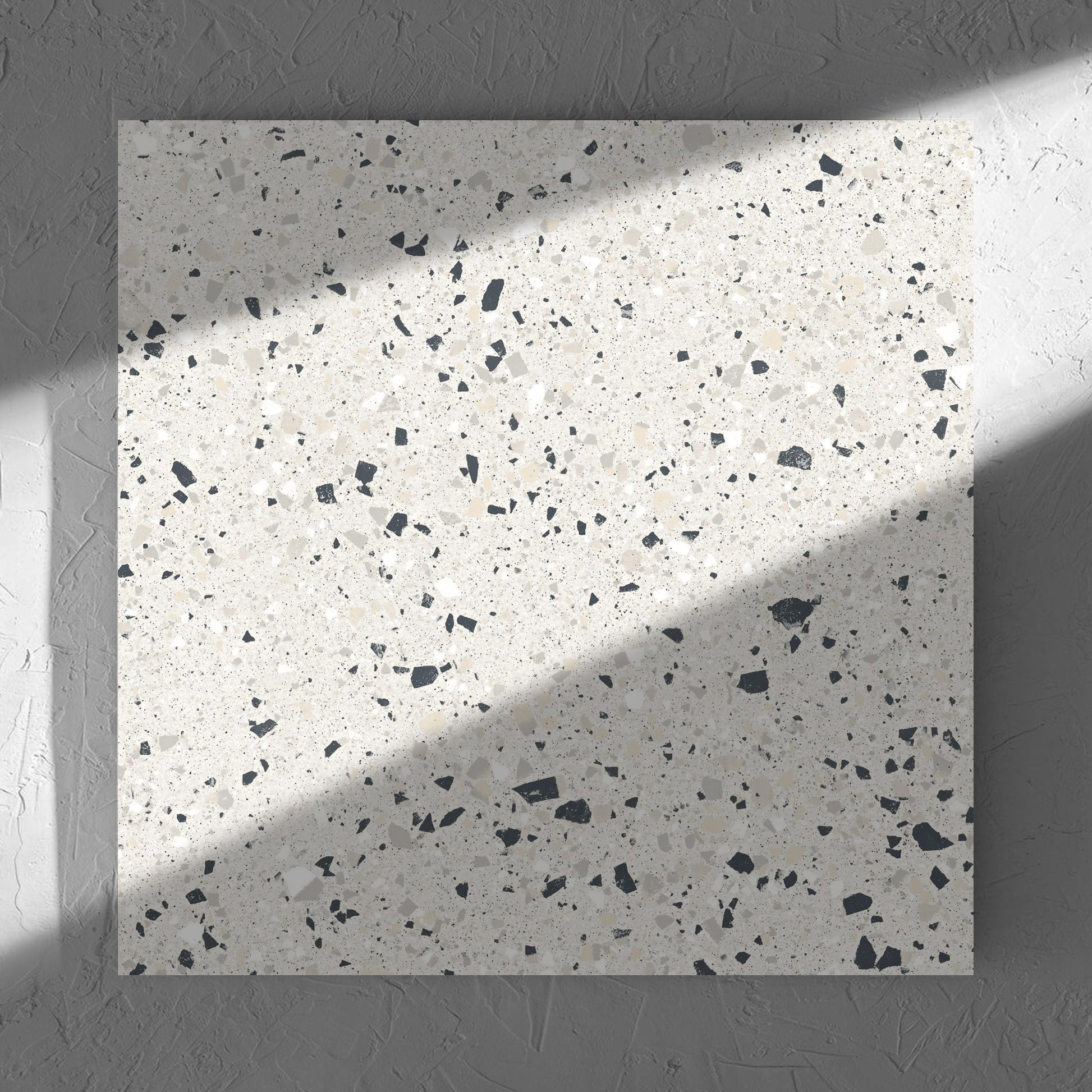 C Venice 600x600 Matt Silver Terrazzo Look Rectified tile in soft natural window light, showing the tile surface