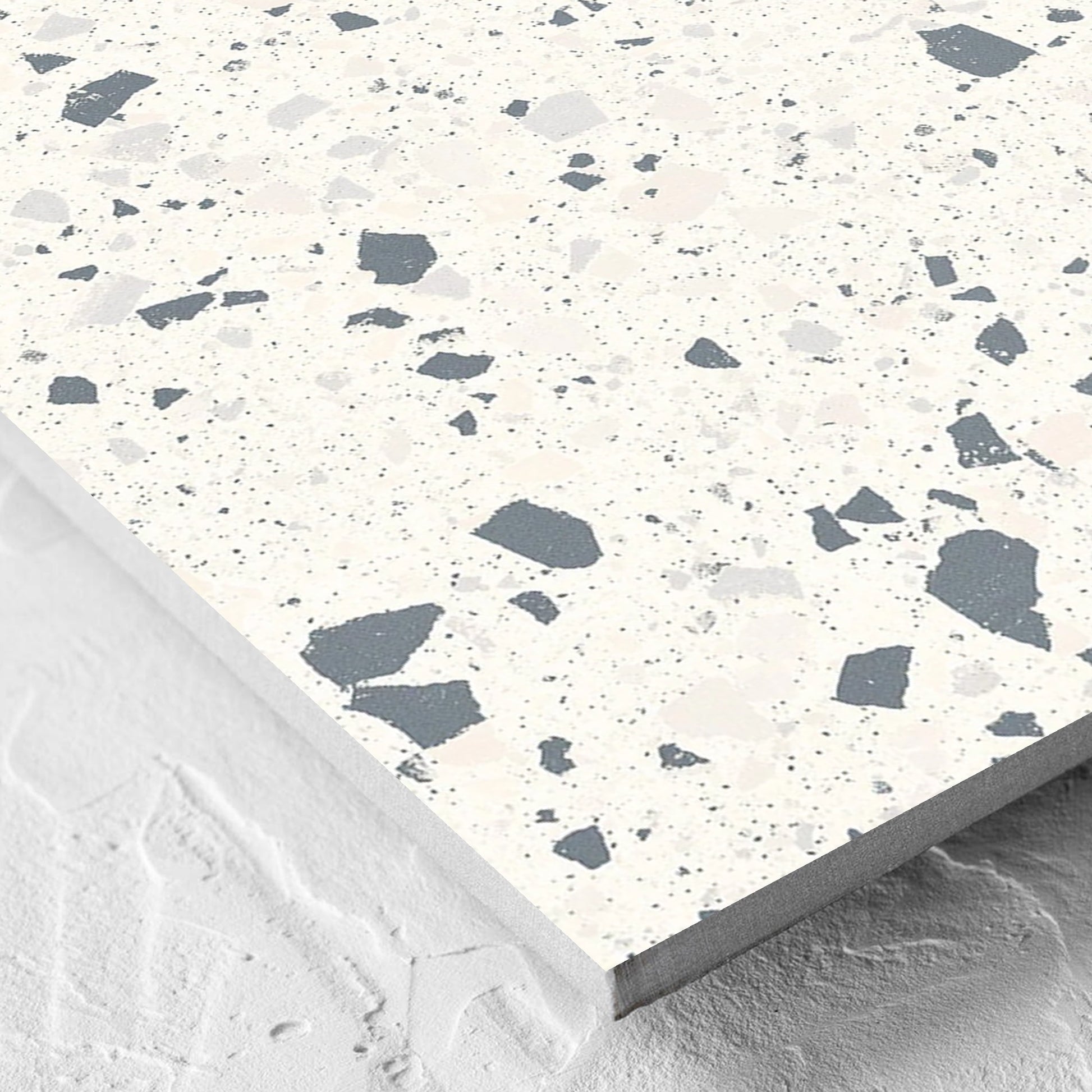 Corner close-up of the C Venice 600x600 Matt White Terrazzo Look Rectified tile showing the tile surface and the edge profile