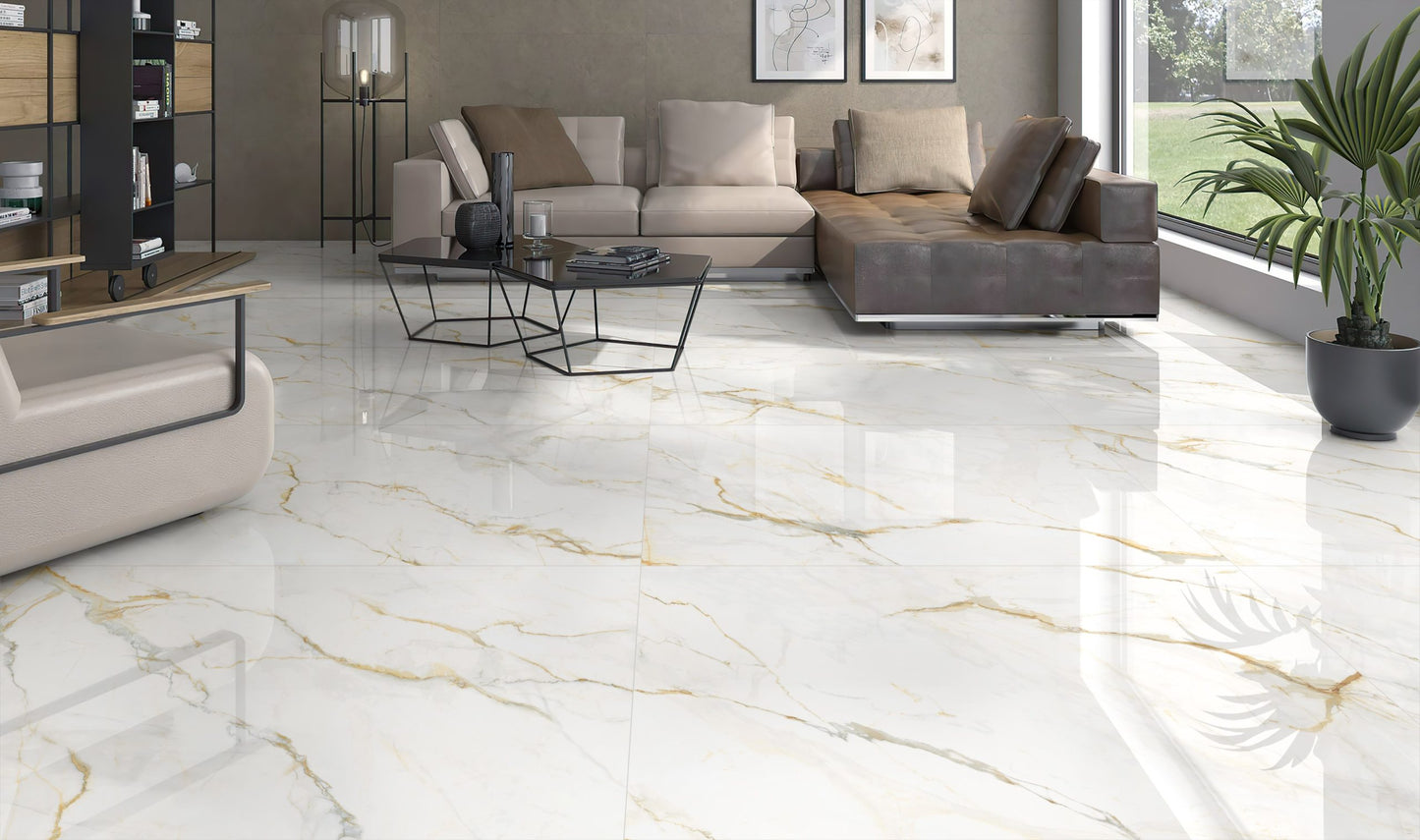 Calacatta Vagli Matt 600x600mm white marble-effect floor tiles with gold veining installed in a modern living room with sectional sofa and coffee table.