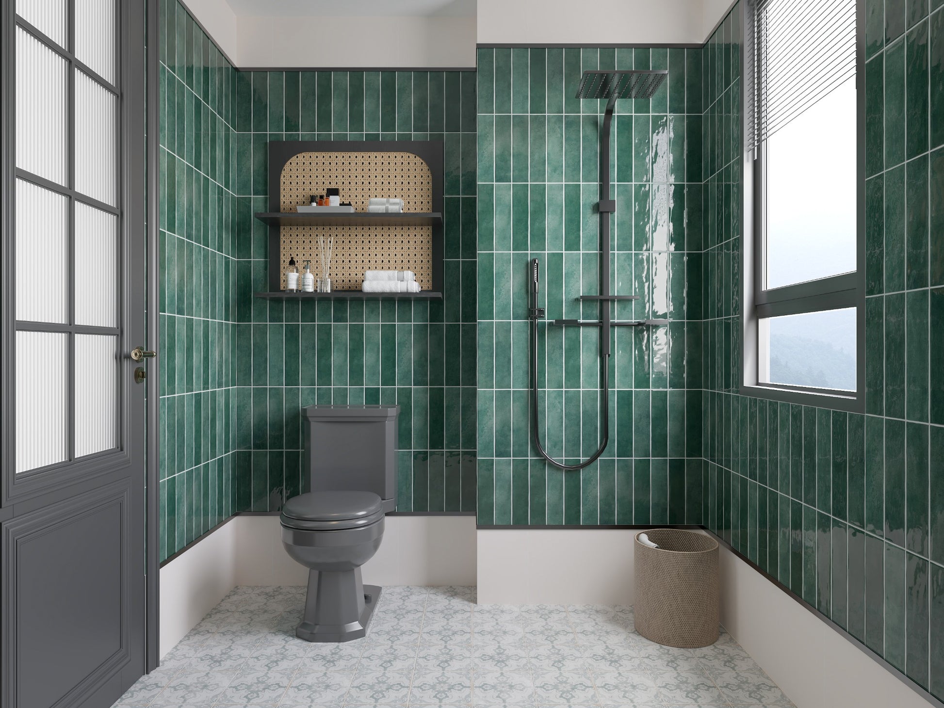 Caramela Dark Green Gloss 75x300mm tiles installed floor-to-ceiling in a stylish bathroom featuring a matte black rainfall shower, grey toilet, and decorative rattan niche shelving.