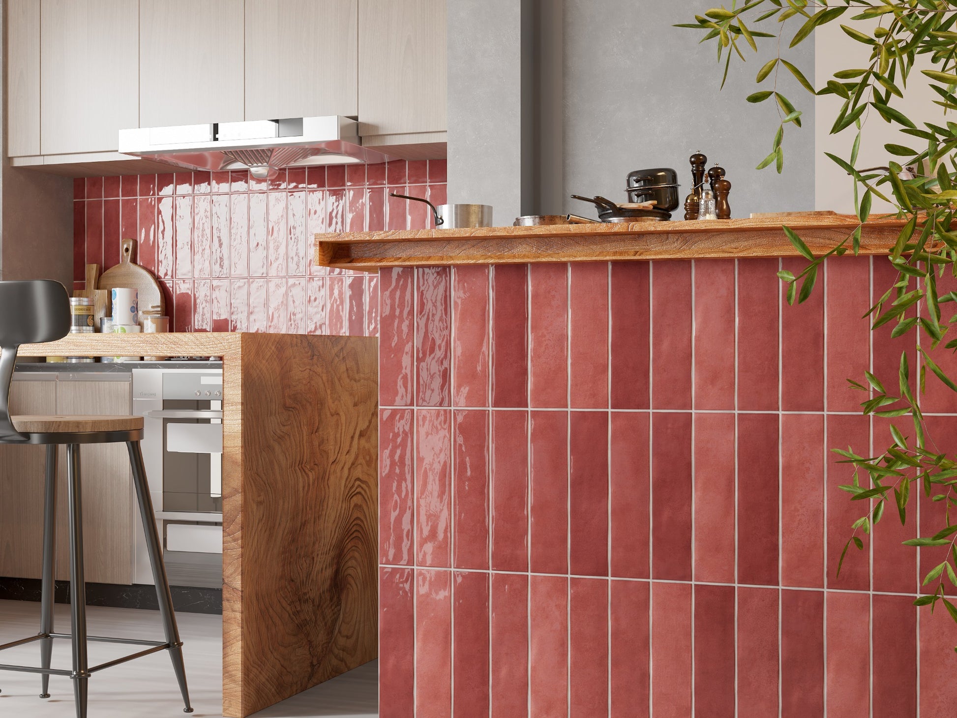 Caramela Red Gloss 75x300mm tiles installed vertically on a kitchen island and splashback, paired with warm timber countertops and a bar stool.