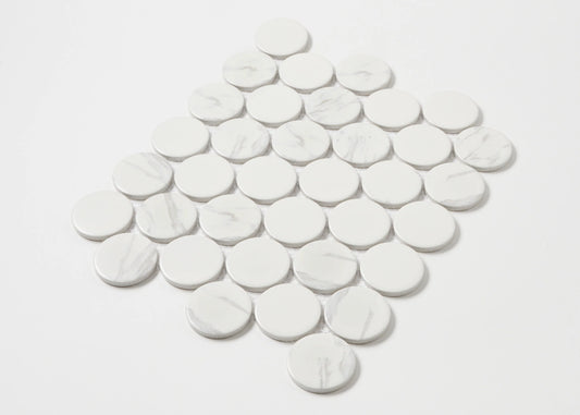 Carrara Look Matte Porcelain Glazed Penny Round 48mm tiles arranged in a diamond-shaped mosaic sheet, showing white glazed circular tiles with subtle grey marble veining.