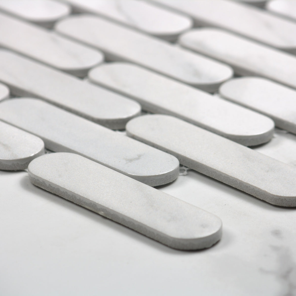 Carrara Matt Round Head Finger Glazed Mosaic 23x93mm angle view