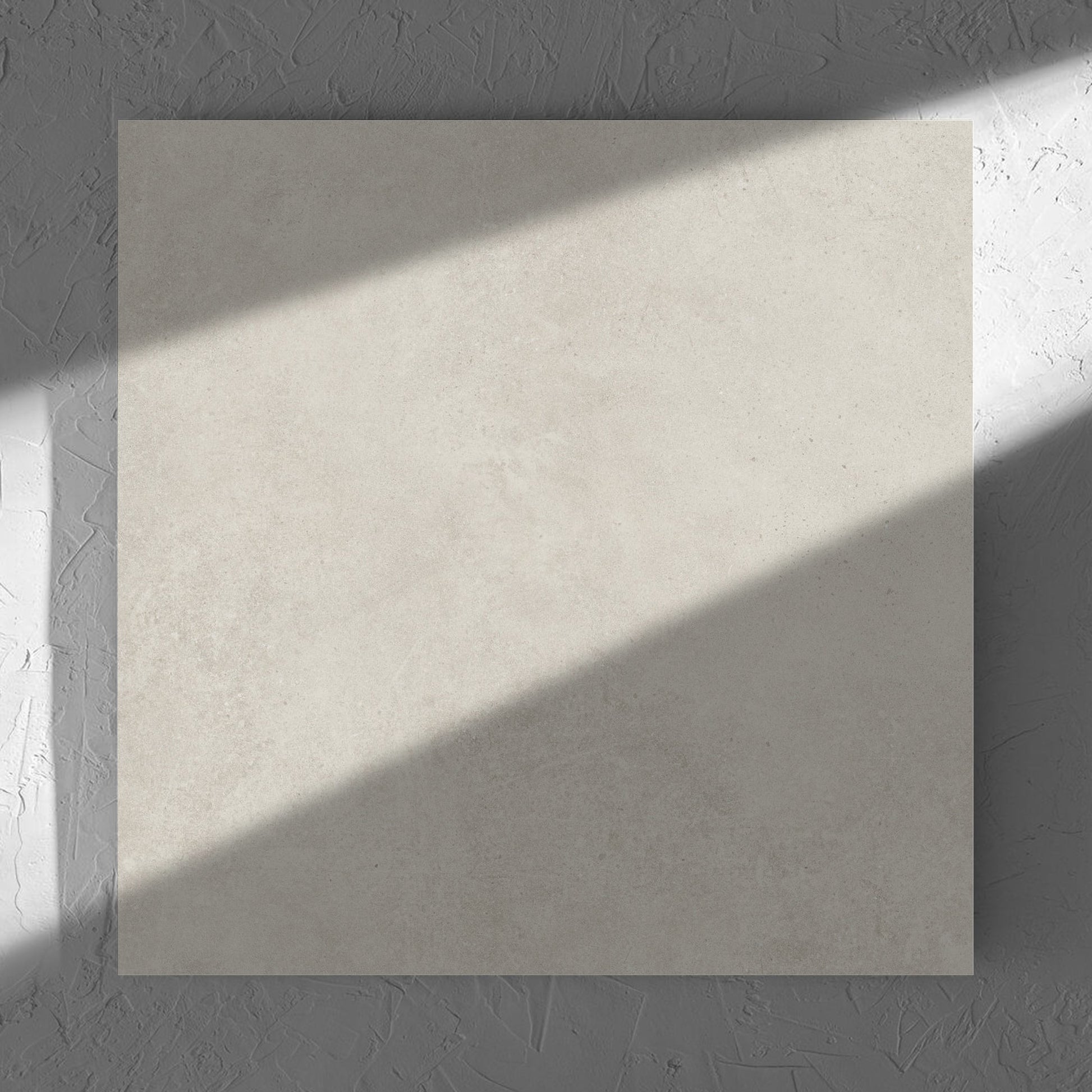 Cement Light Grey Matt 600x600mm tile in soft natural window light, showing the matt surface
