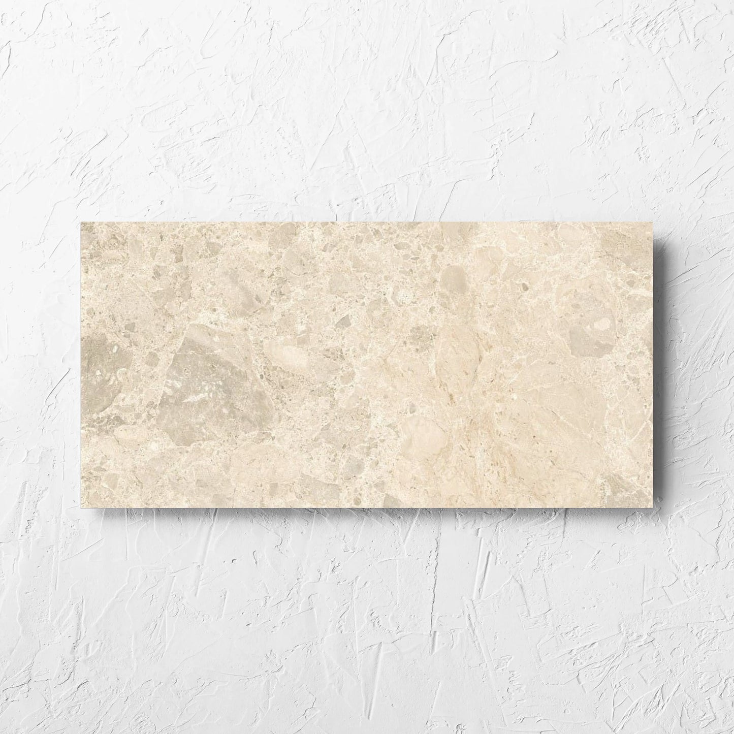 Ceppo Light Beige InOut 300x600mm tile laid flat on a white rendered wall, showing the tile surface
