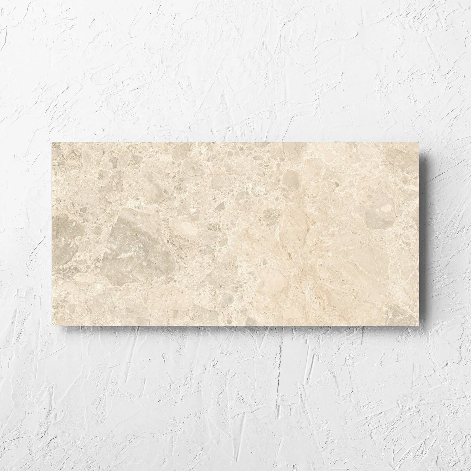 Ceppo Light Beige InOut 300x600mm tile laid flat on a white rendered wall, showing the tile surface