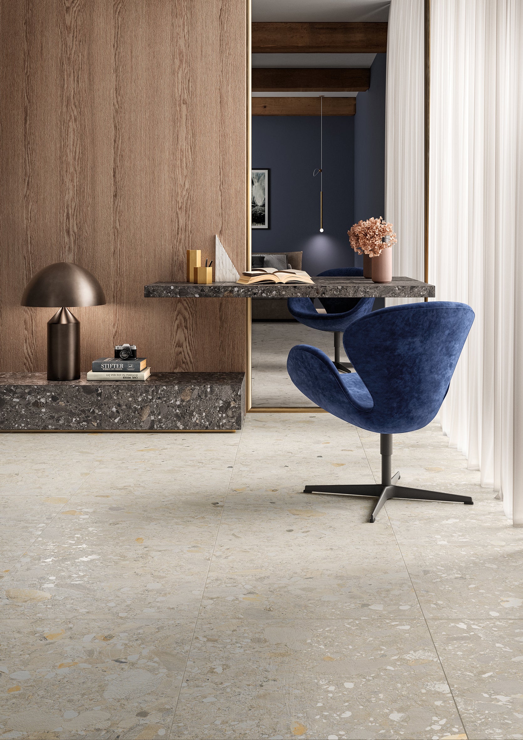 Ceppo Light Beige InOut 300x600mm porcelain floor tiles laid in a contemporary study lounge featuring a velvet blue Swan chair, marble desk, and warm timber wall panelling.