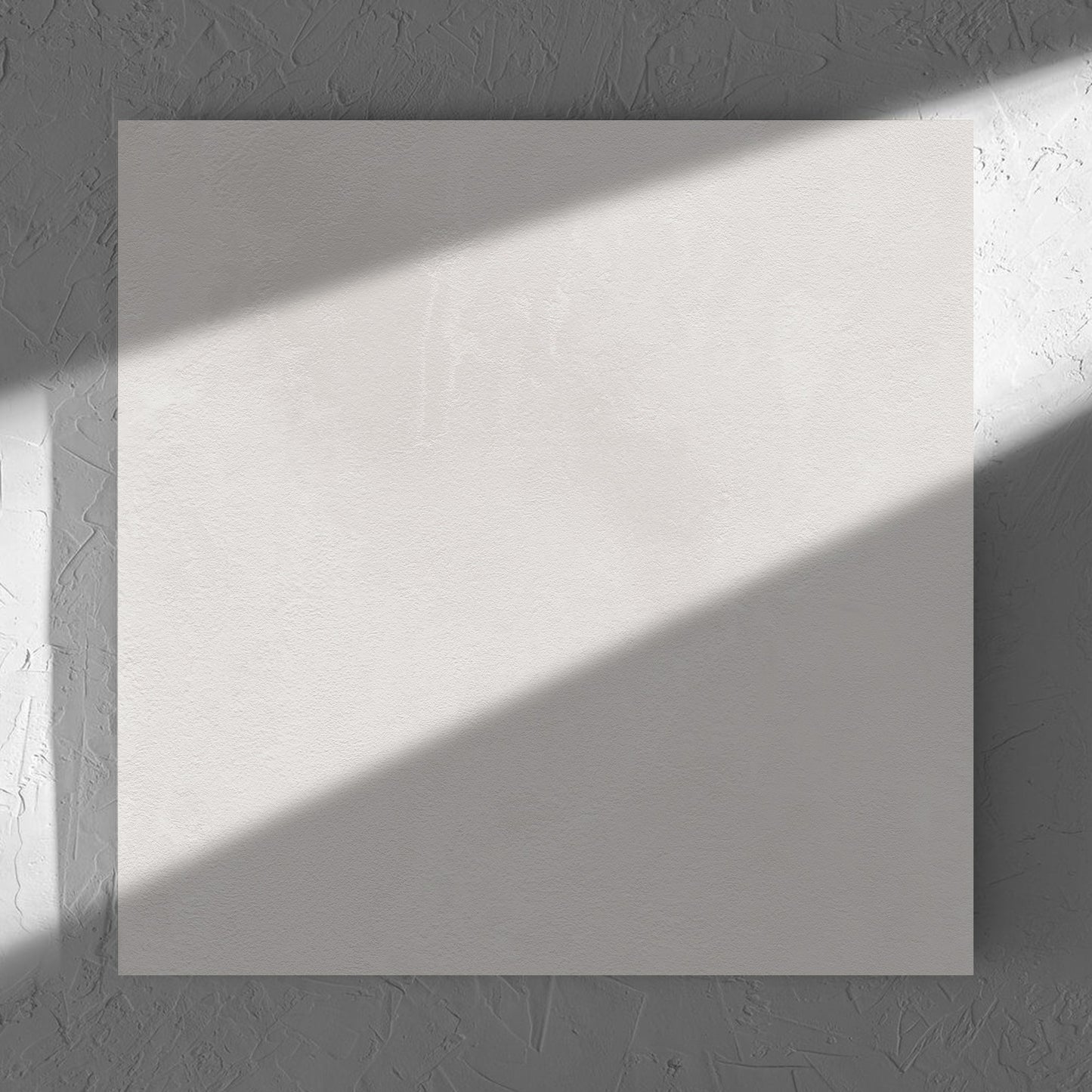 Clay Bari White 600x600mm tile in soft natural window light, showing the matt surface