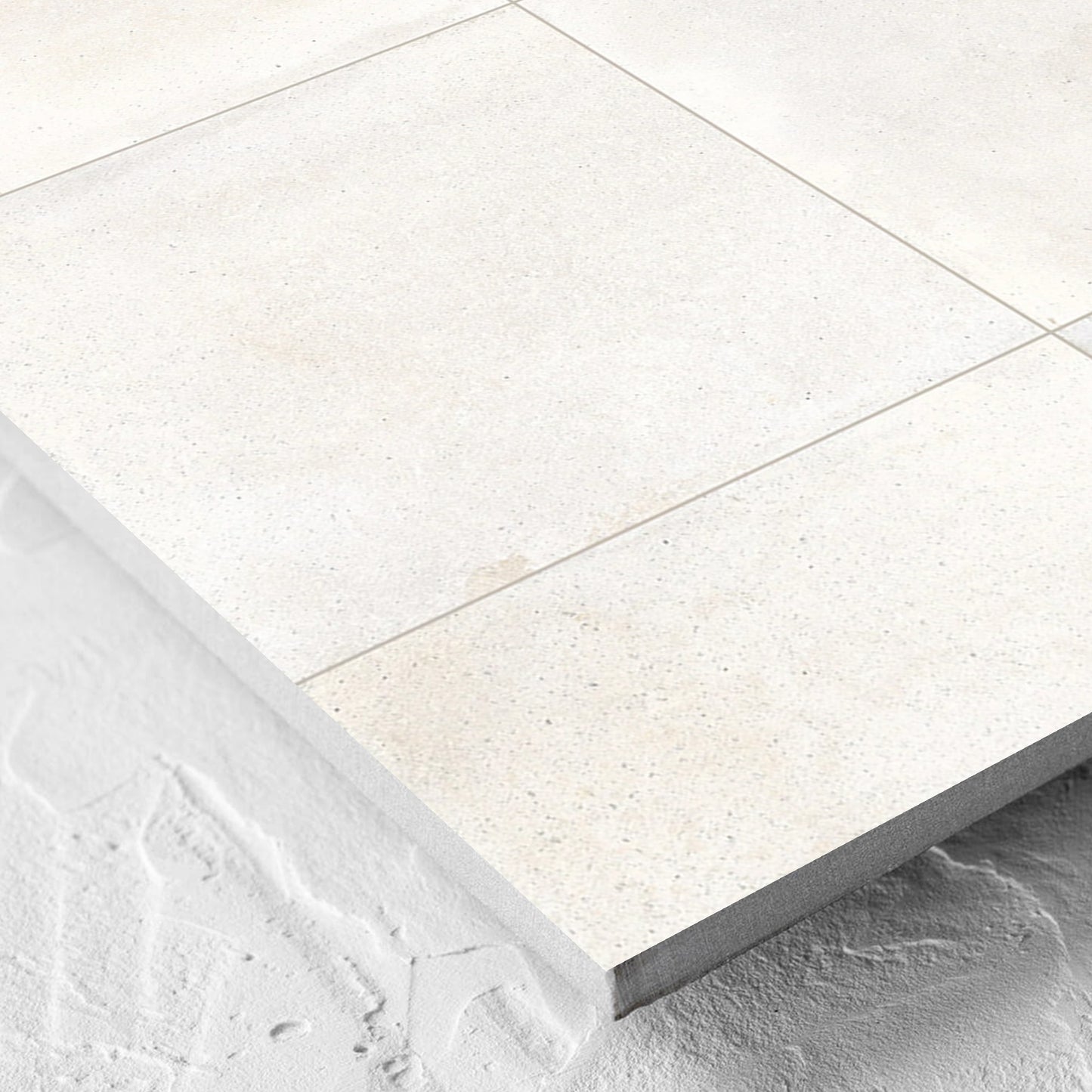 Corner close-up of the Cotto Ice Matt 600x600mm tile showing the matt surface and the edge profile