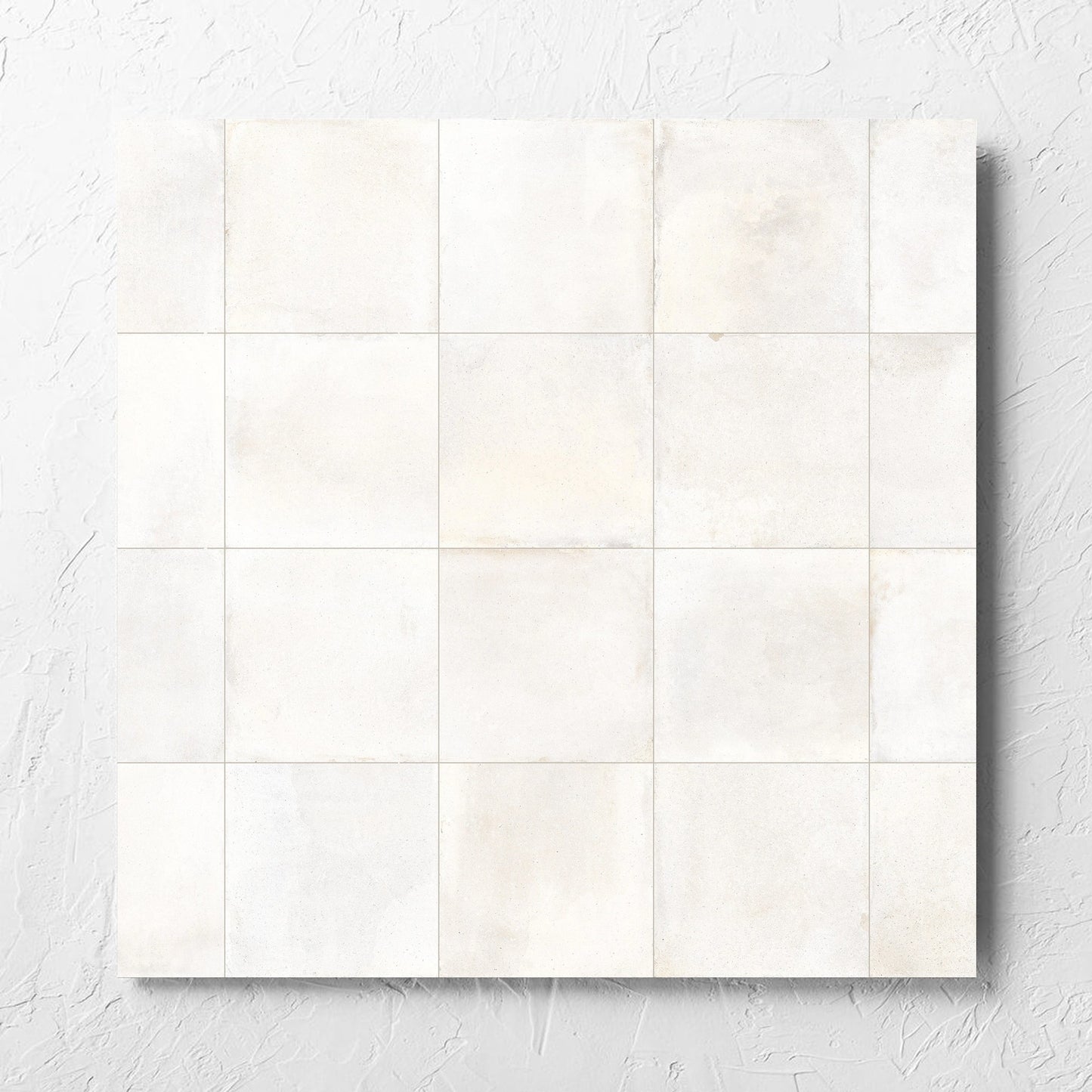 Cotto Ice Matt 600x600mm tile laid flat on a white rendered wall, showing the matt surface