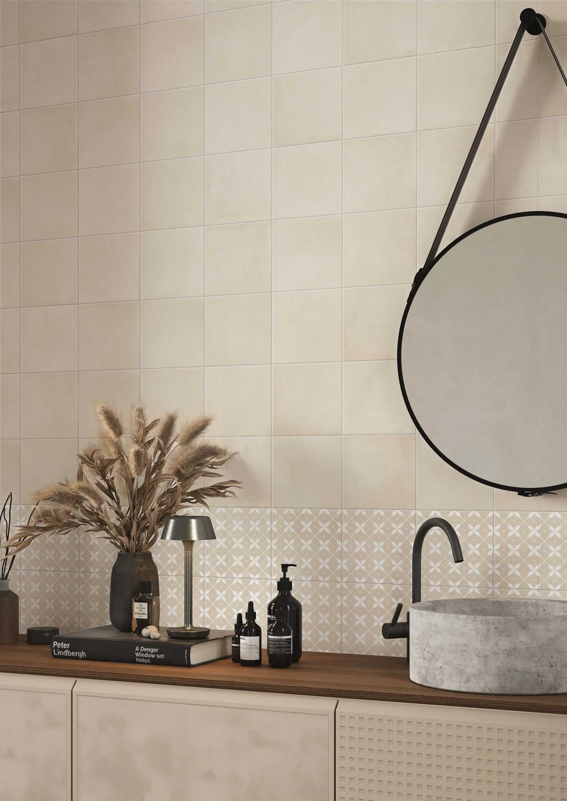Craft Art Ice 200x200mm tiles installed as a bathroom wall featuring a decorative patterned border above a timber vanity with stone basin and round mirror.