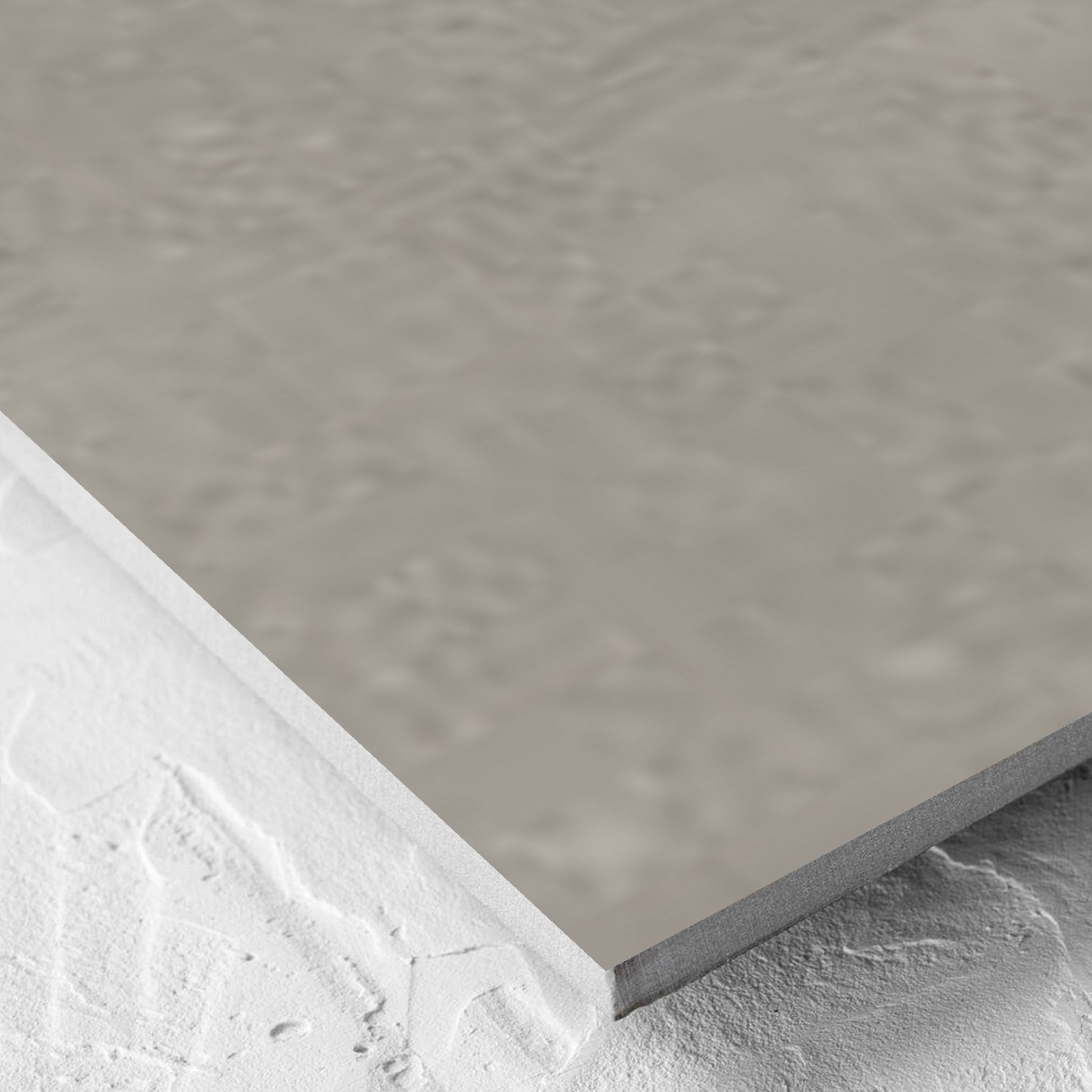 Corner close-up of the Crystal Quartz Greige Matt Rectified 600x600mm tile showing the tile surface and the edge profile
