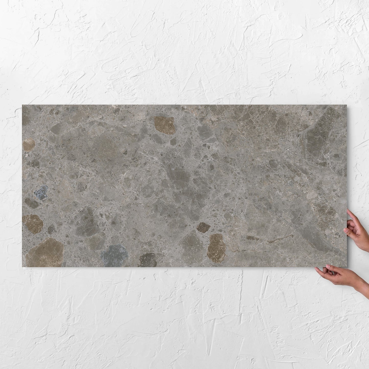 Bedrock Mid Grey Matt 600x1200mm tile with hands