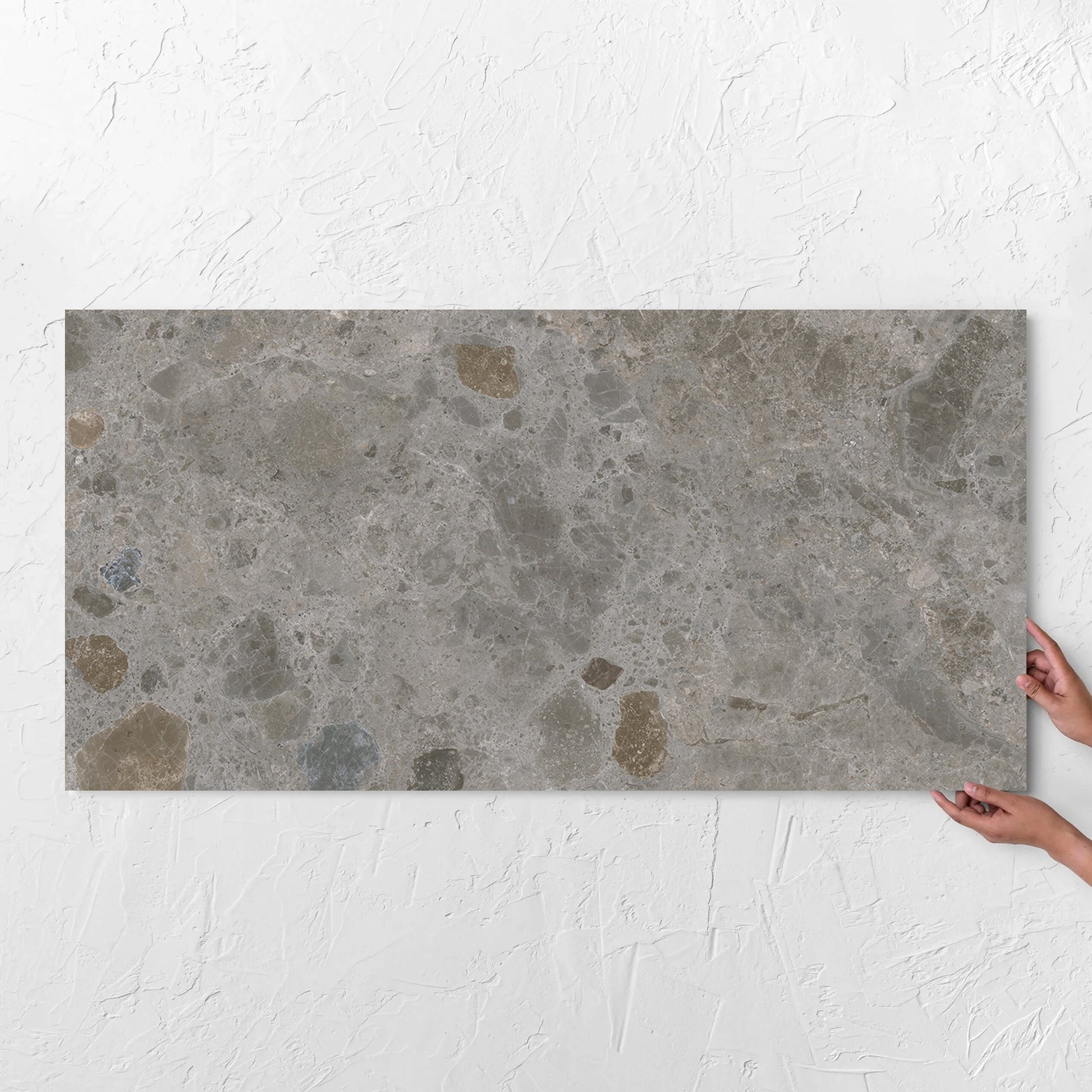 Bedrock Mid Grey Matt 600x1200mm tile with hands