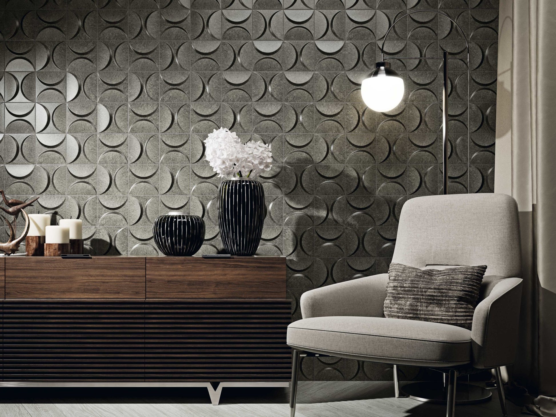 Eclipse Iron 300x300mm geometric relief tiles installed as a living room feature wall, styled with a walnut sideboard, arc floor lamp, and contemporary armchair.