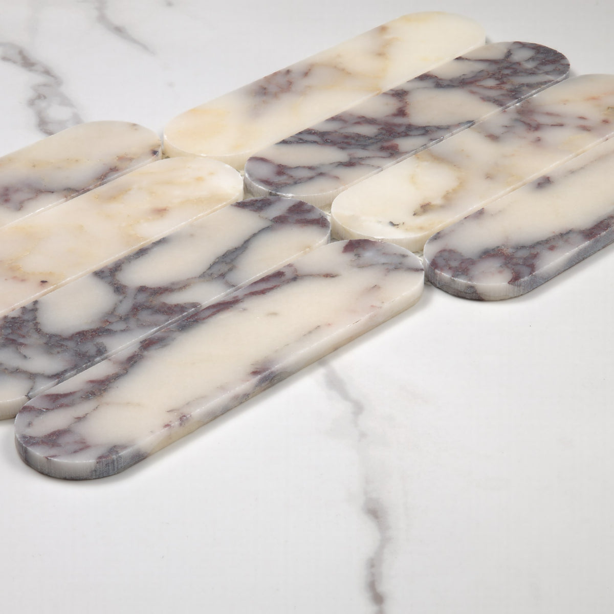 Elementa Calacatta Viola Cylinder Mosaic 50x198mm angle view