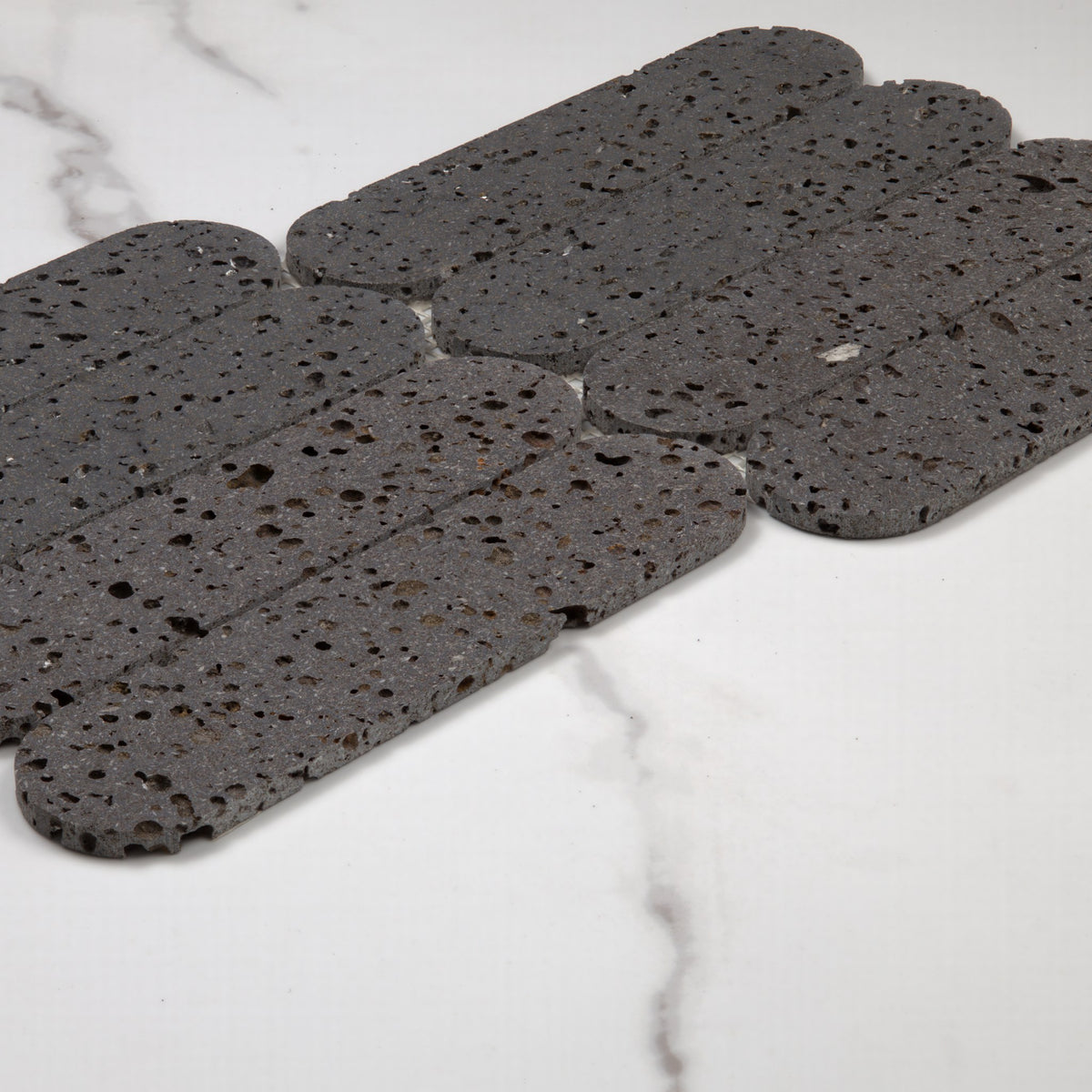 Elementa Travertine Black Cylinder Mosaic 50x198mm angle view