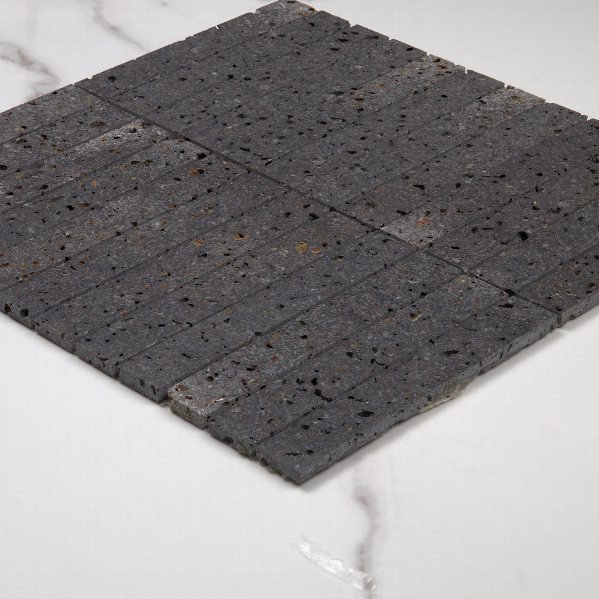 Elementa Travertine Black Finger Mosaic 23x148mm angle view
