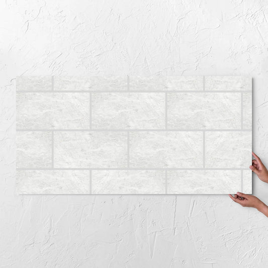 Antalya Bianco Amber 600x1200mm tile with hands