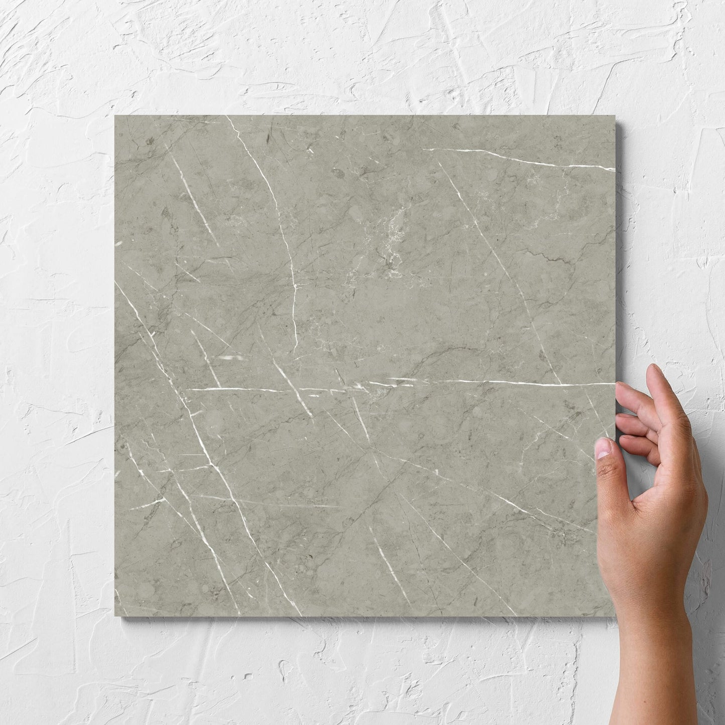 Pedra Light Grey Matt 300x300mm hand 1