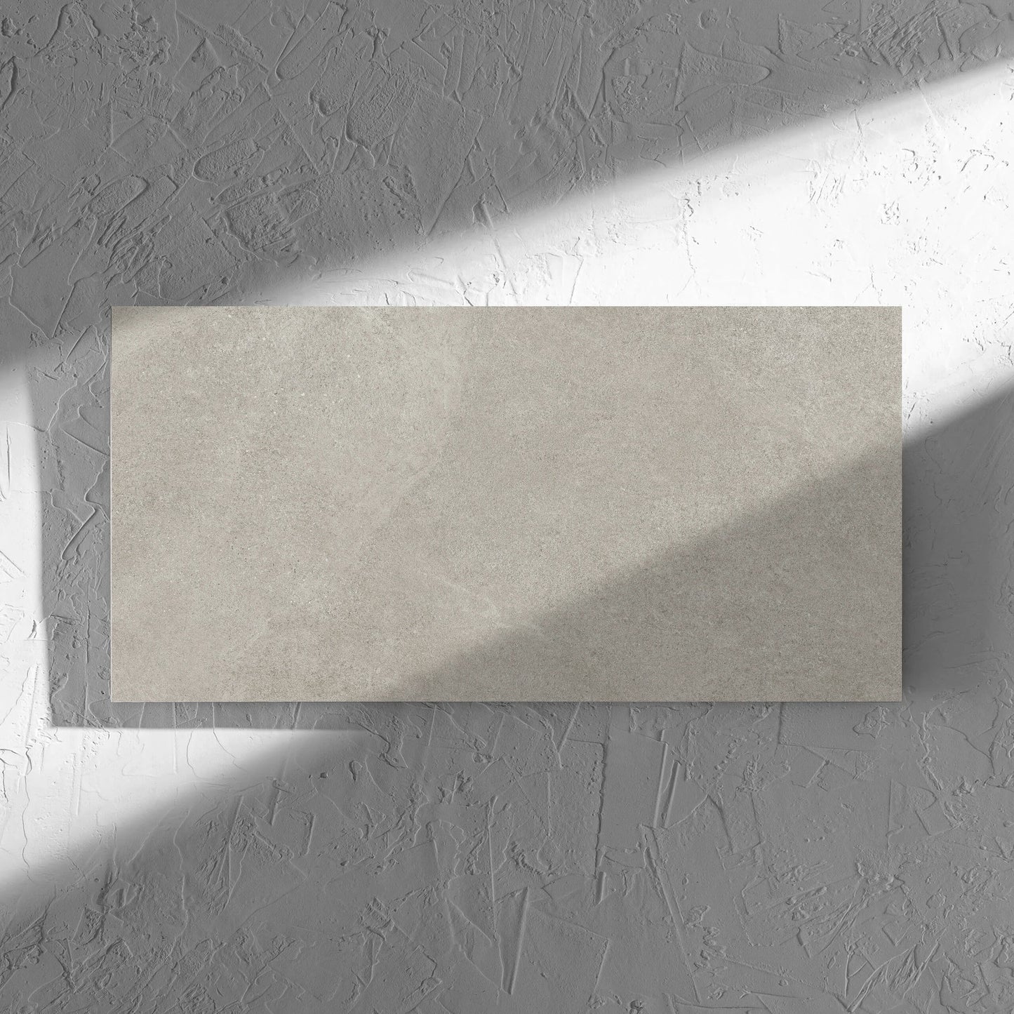 Fusion Cenere Ultra Tech 300x600mm tile in soft natural window light, showing the matt surface