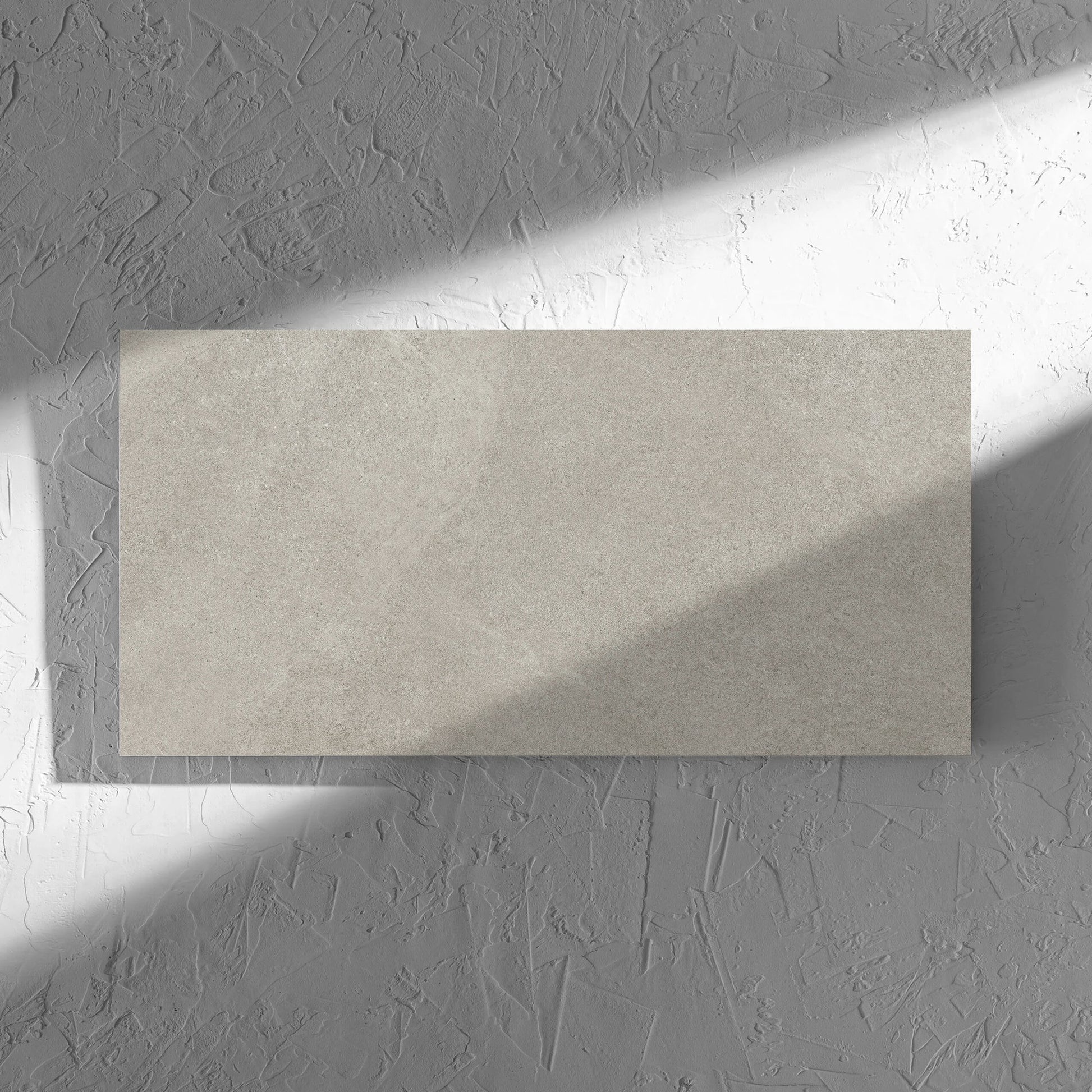 Fusion Cenere Ultra Tech 300x600mm tile in soft natural window light, showing the matt surface
