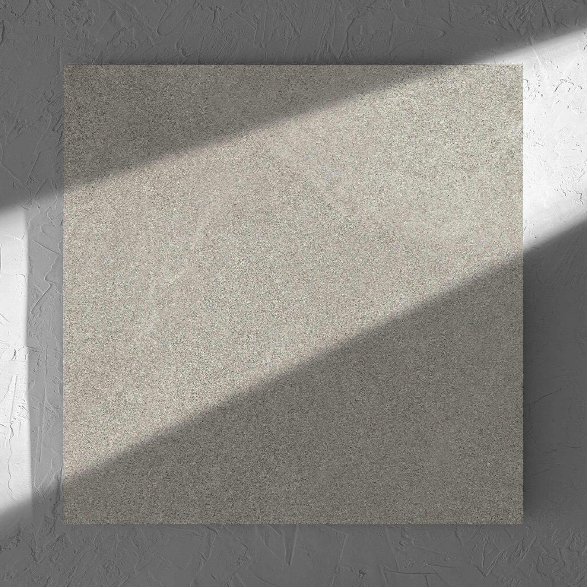 Fusion Cenere Ultra Tech 600x600mm tile in soft natural window light, showing the matt surface