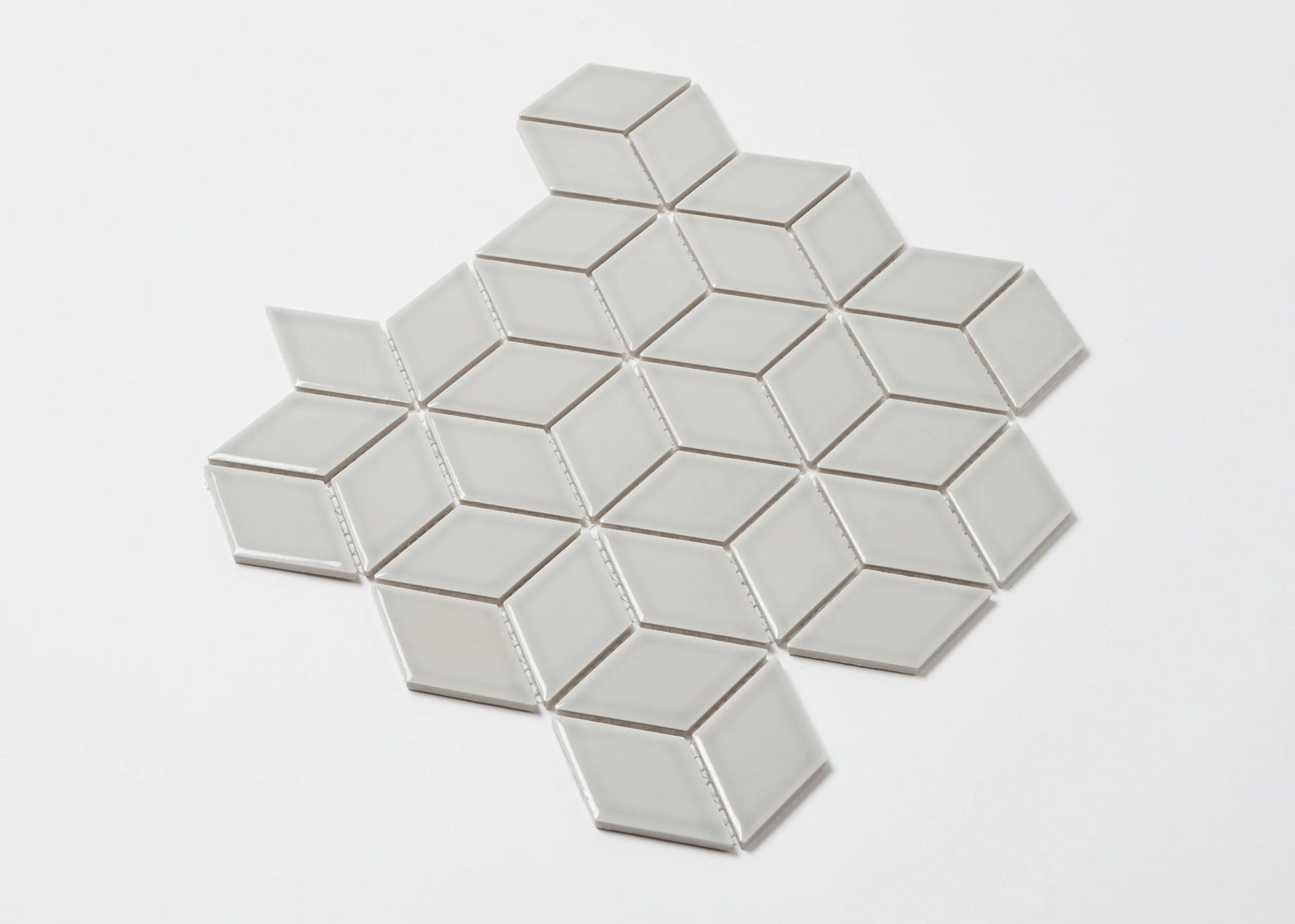 Pack shot of Grey Gloss Cube 48x48mm mosaic tile sheet featuring diamond-shaped gloss ceramic tiles arranged in a 3D cube optical illusion pattern.
