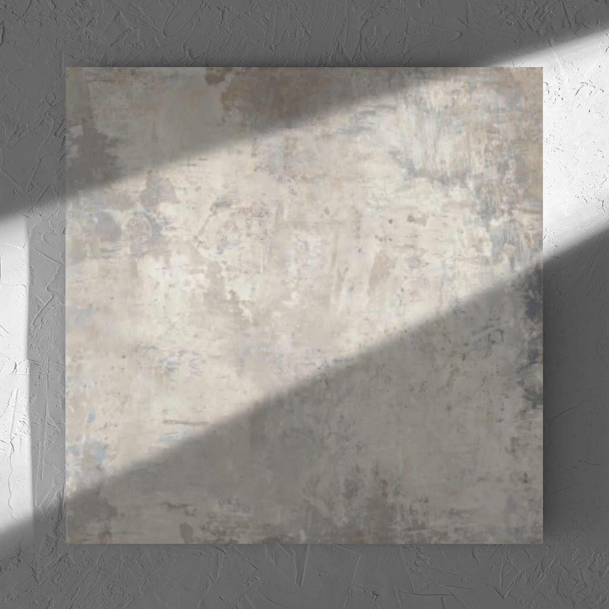 Grunge Beige Rectified 600x600mm tile in soft natural window light, showing the tile surface
