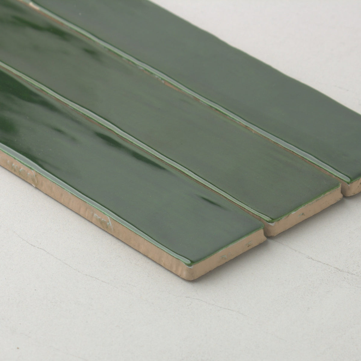 Spanish Handmade Gloss Verde Cobre 75x300mm angle view