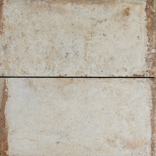 Close-up texture detail of Havana Sugar Cane 200x400mm tiles showing a weathered, aged finish in warm cream and sandy beige tones with rustic surface variation.