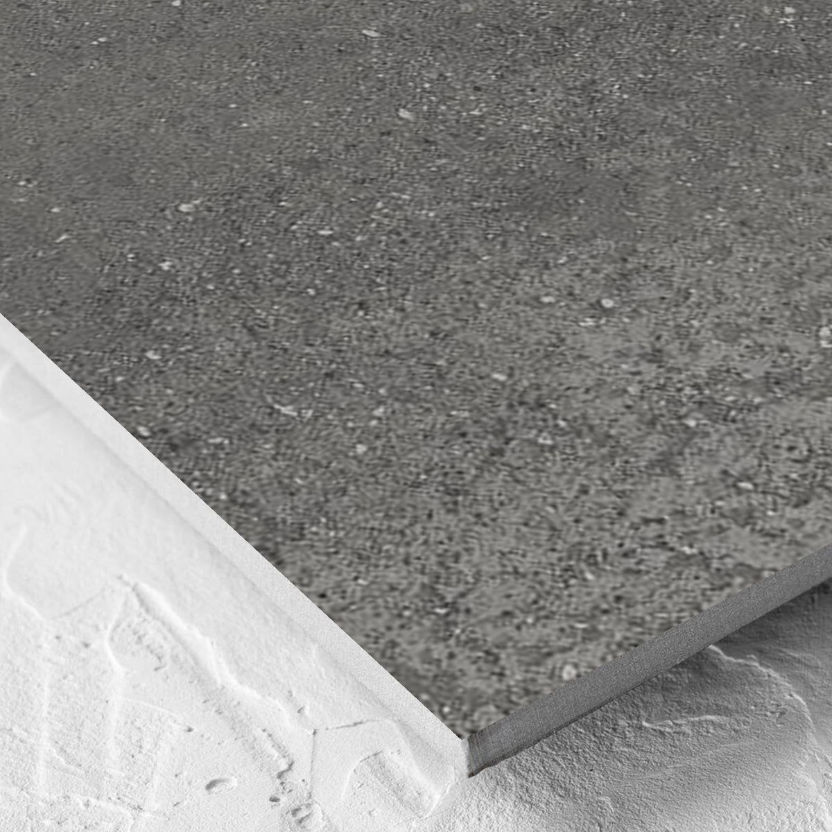 Corner close-up of the Imperial Dark Grey Matt 600x600mm tile showing the tile surface and the edge profile