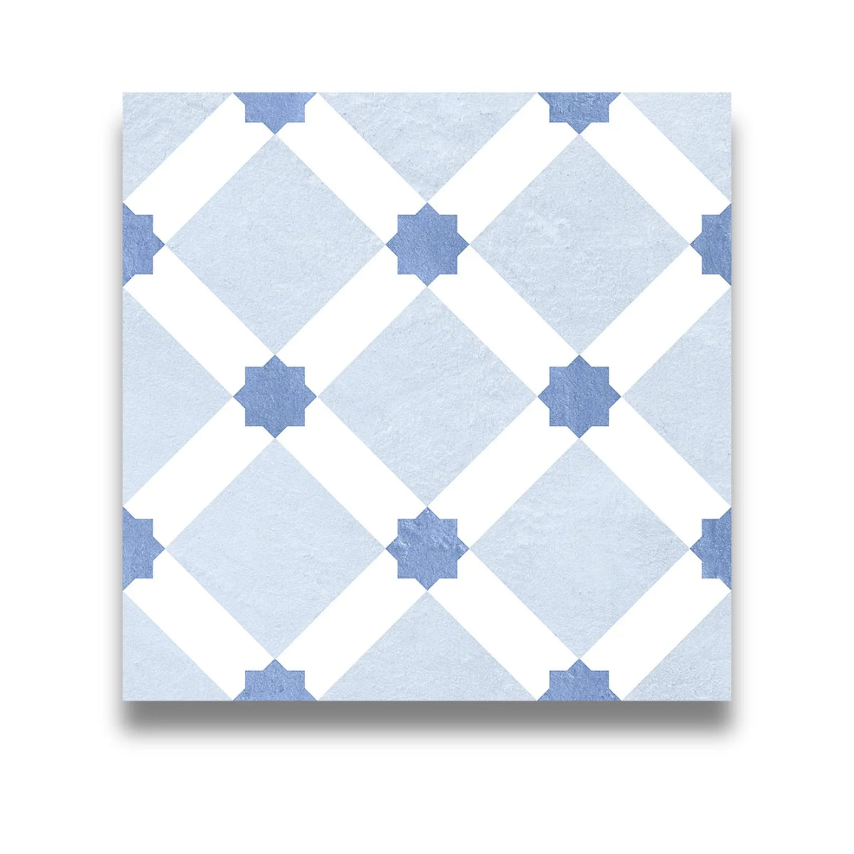 Island Minorca 205x205mm encaustic-style tile featuring a geometric diamond lattice pattern with blue eight-pointed stars on a pale blue and white textured surface.